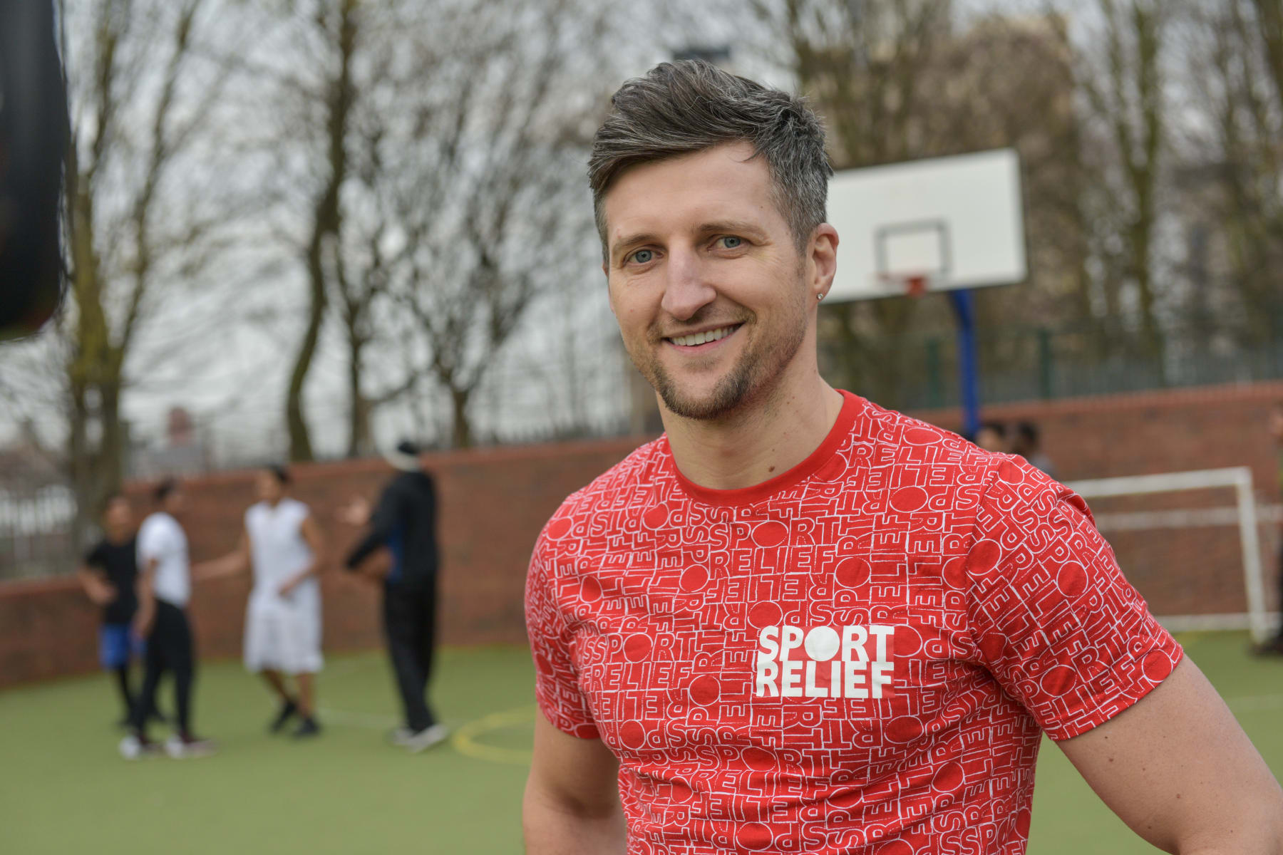 LONDON, UNITED KINGDOM - MARCH 2016: British former professional boxer, Carl Froch MBE visits Comic Relief 2015 funded project, The Big Brother and Big Sister Club during the 2016 Sport Relief campaign. Taken on the 15th March 2016. (Photo by Sam Kirby/Comic Relief via Getty Images)