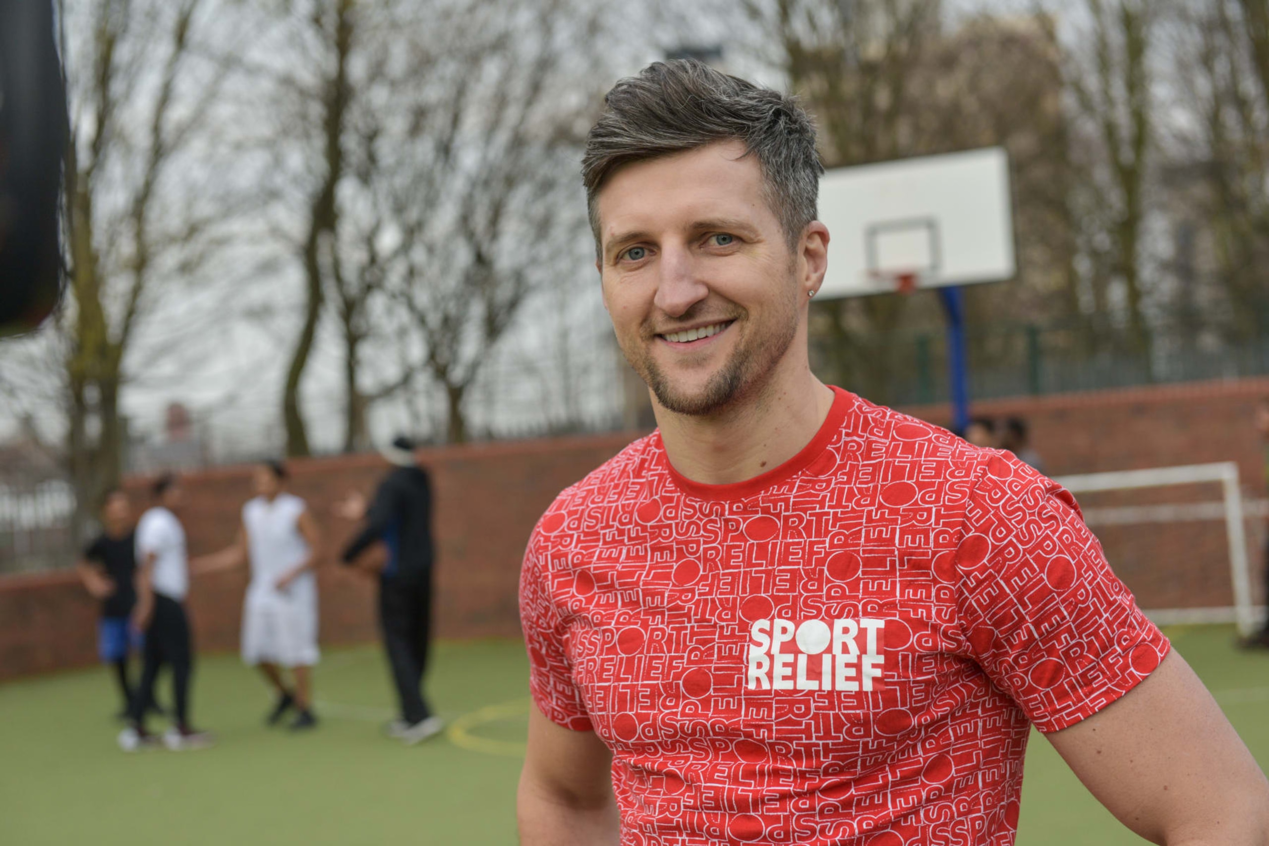 LONDON, UNITED KINGDOM - MARCH 2016: British former professional boxer, Carl Froch MBE visits Comic Relief 2015 funded project, The Big Brother and Big Sister Club during the 2016 Sport Relief campaign. Taken on the 15th March 2016. (Photo by Sam Kirby/Comic Relief via Getty Images)