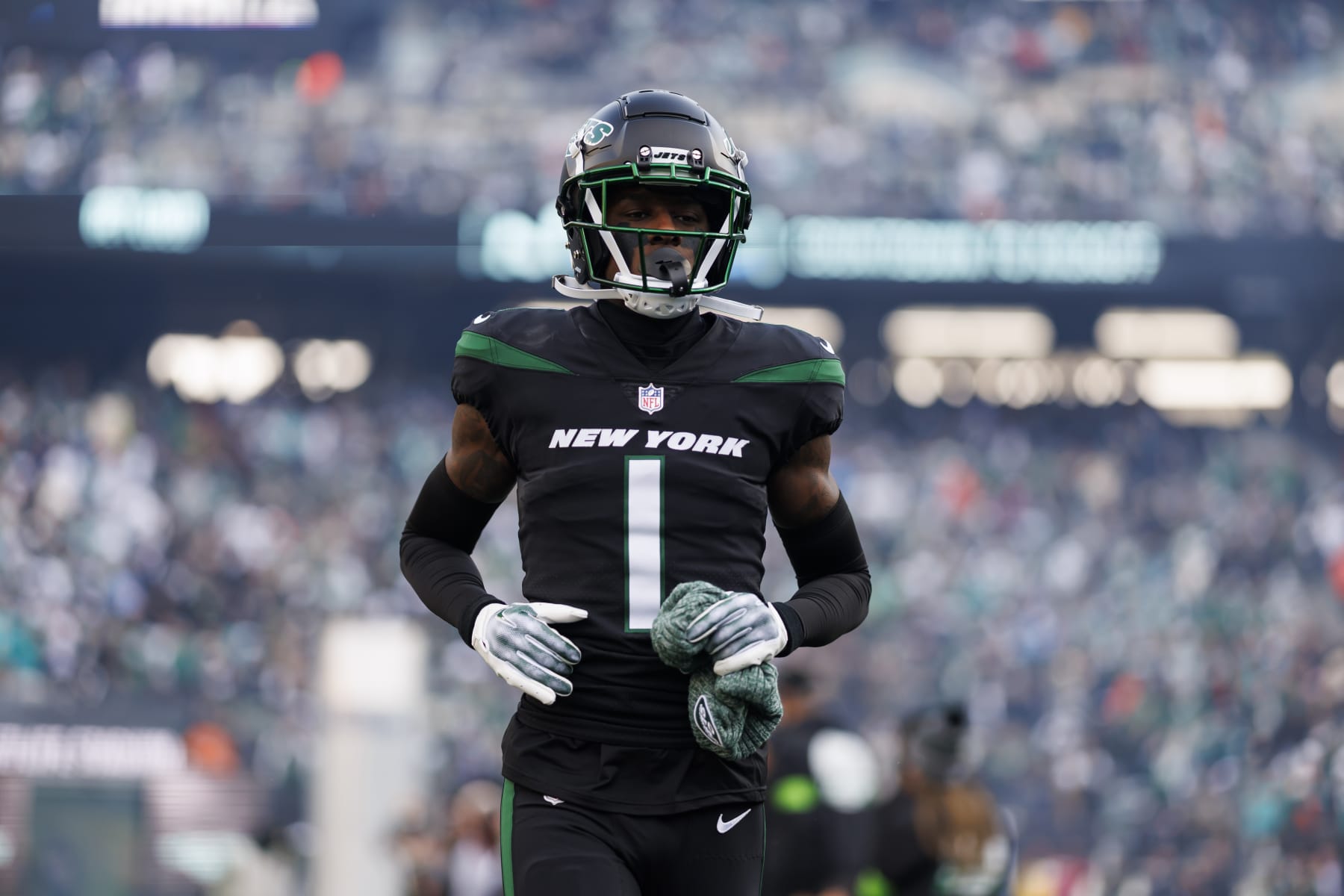 EAST RUTHERFORD, NEW JERSEY - NOVEMBER 24: Sauce Gardner #1 of the New York Jets runs onto the field during team entrances before an NFL football game against the Miami Dolphins at MetLife Stadium on November 24, 2023 in East Rutherford, New Jersey. (Photo by Ryan Kang/Getty Images)