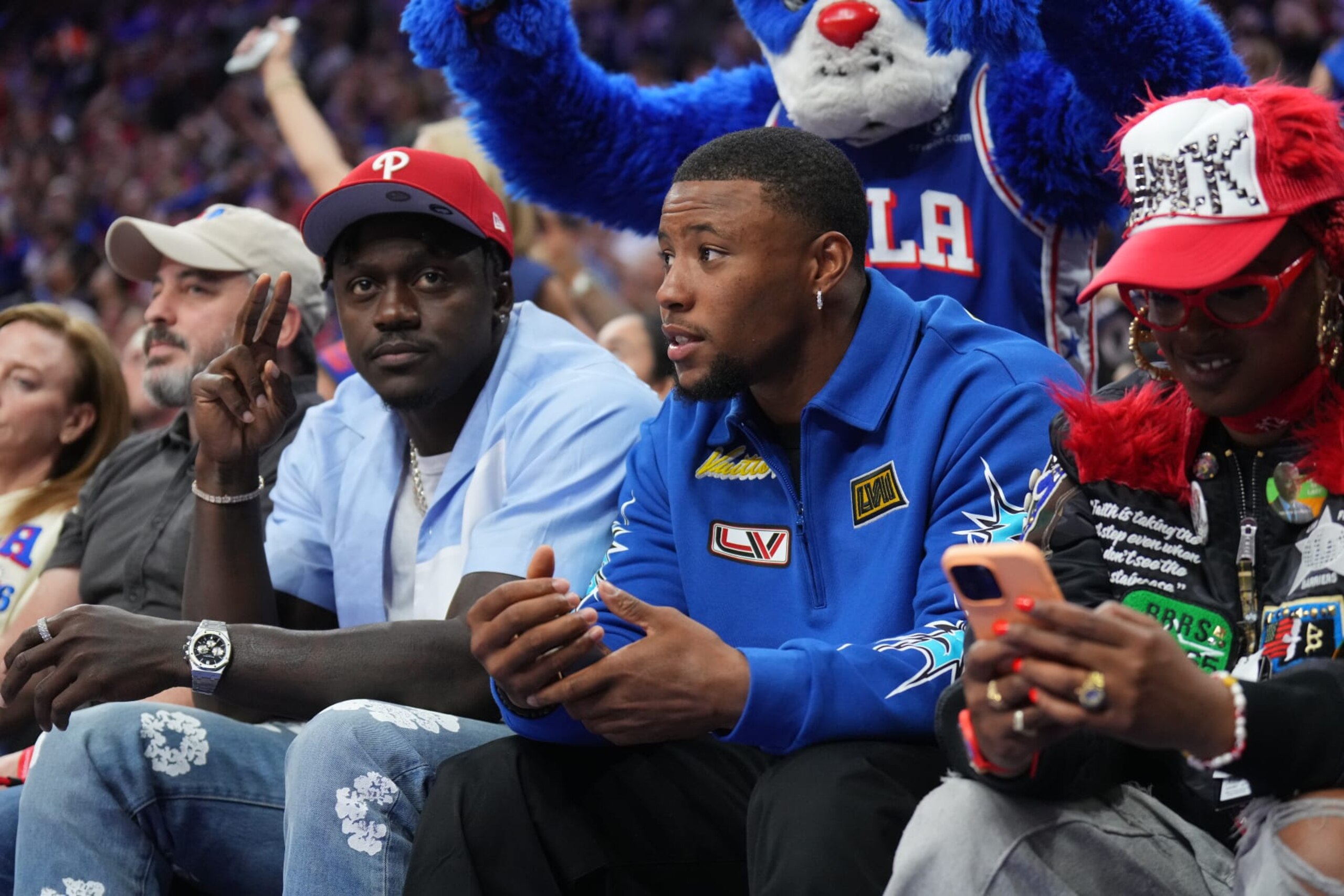 PHILADELPHIA, PA - MAY 2: A.J. Brown and Saquon Barkley attend the game between the New York Knicks and the Philadelphia 76ers during Round 1 Game 6 of the 2024 NBA Playoffs on May 2, 2024 at the Wells Fargo Center in Philadelphia, Pennsylvania NOTE TO USER: User expressly acknowledges and agrees that, by downloading and/or using this Photograph, user is consenting to the terms and conditions of the Getty Images License Agreement. Mandatory Copyright Notice: Copyright 2024 NBAE (Photo by Jesse D. Garrabrant/NBAE via Getty Images) PHILADELPHIA, PA - MAY 2: A.J. Brown and Saquon Barkley attend the game between the New York Knicks and the Philadelphia 76ers during Round 1 Game 6 of the 2024 NBA Playoffs on May 2, 2024 at the Wells Fargo Center in Philadelphia, Pennsylvania NOTE TO USER: User expressly acknowledges and agrees that, by downloading and/or using this Photograph, user is consenting to the terms and conditions of the Getty Images License Agreement. Mandatory Copyright Notice: Copyright 2024 NBAE (Photo by Jesse D. Garrabrant/NBAE via Getty Images)