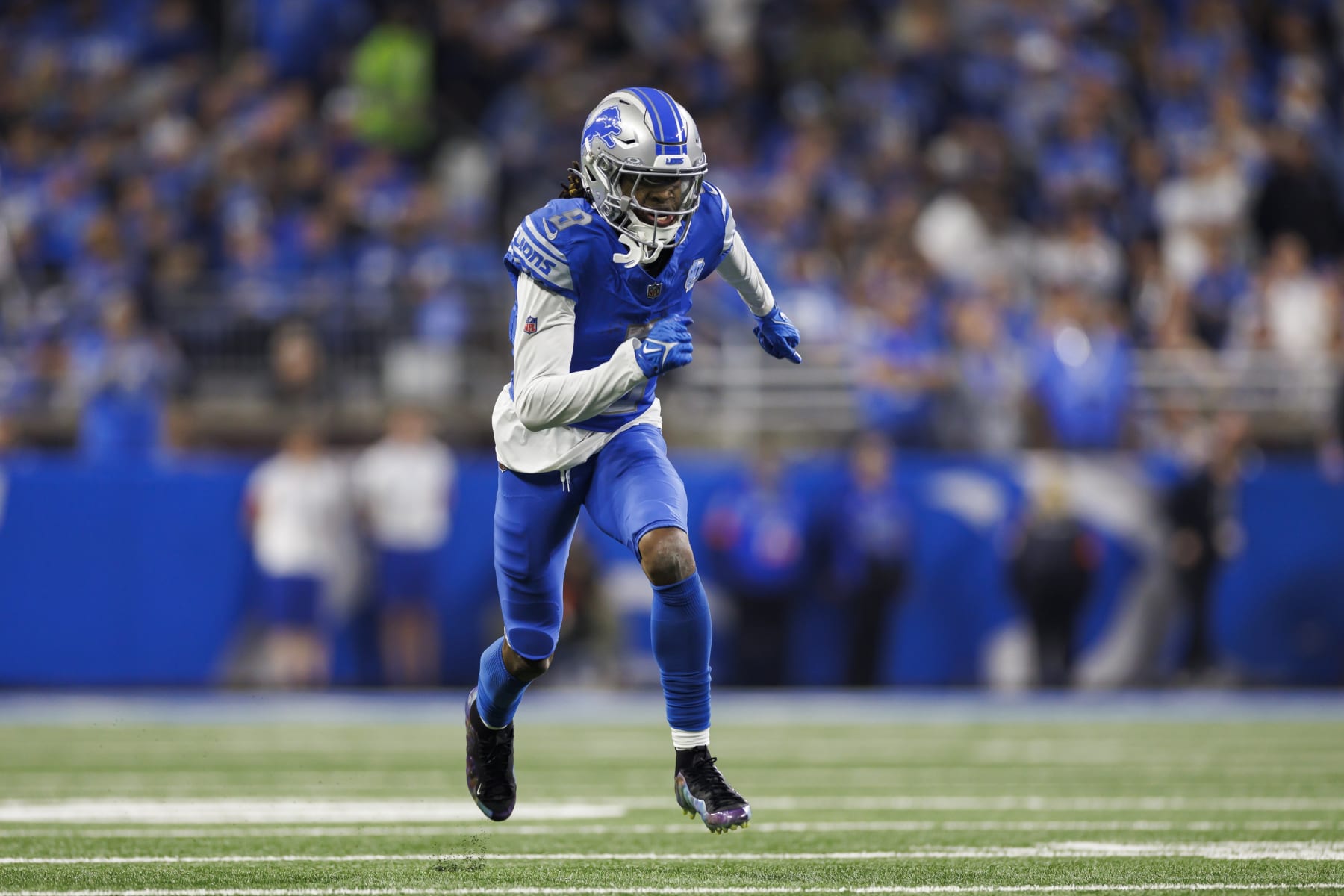 DETROIT, MICHIGAN - JANUARY 14: Jameson Williams #9 of the Detroit Lions runs a route during an NFC Wild Card Playoff football game against the Los Angeles Rams at Ford Field on January 14, 2024 in Detroit, Michigan. (Photo by Ryan Kang/Getty Images) DETROIT, MICHIGAN - JANUARY 14: Jameson Williams #9 of the Detroit Lions runs a route during an NFC Wild Card Playoff football game against the Los Angeles Rams at Ford Field on January 14, 2024 in Detroit, Michigan. (Photo by Ryan Kang/Getty Images)