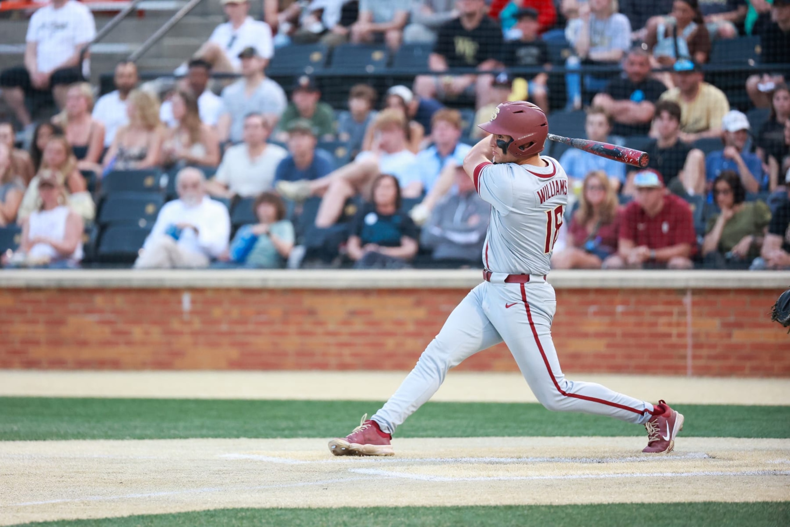 WINSTON SALEM, NORTH CAROLINA - APRIL 19: Max Williams #18 of the Florida State Seminoles makes a swing against the Wake Forest Demon Deacons at David F. Couch Ballpark on April 19, 2024 in Winston Salem, North Carolina. (Photo by Isaiah Vazquez/Getty Images) WINSTON SALEM, NORTH CAROLINA - APRIL 19: Max Williams #18 of the Florida State Seminoles makes a swing against the Wake Forest Demon Deacons at David F. Couch Ballpark on April 19, 2024 in Winston Salem, North Carolina. (Photo by Isaiah Vazquez/Getty Images)