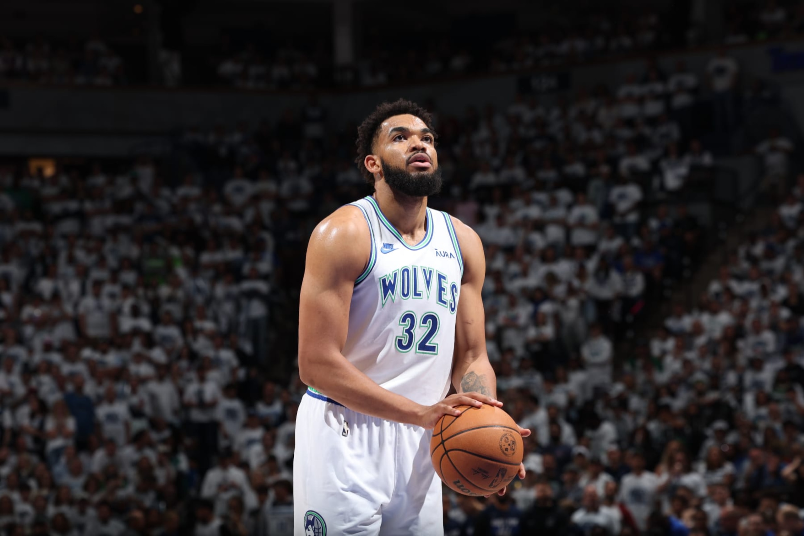MINNEAPOLIS, MN - MAY 22: Karl-Anthony Towns #32 of the Minnesota Timberwolves prepares to shoot a free throwagainst the Dallas Mavericks during Game 2 of the Western Conference Finals of the 2024 NBA Playoffs on May 22, 2024 at Target Center in Minneapolis, Minnesota. NOTE TO USER: User expressly acknowledges and agrees that, by downloading and or using this Photograph, user is consenting to the terms and conditions of the Getty Images License Agreement. Mandatory Copyright Notice: Copyright 2024 NBAE (Photo by David Sherman/NBAE via Getty Images) MINNEAPOLIS, MN - MAY 22: Karl-Anthony Towns #32 of the Minnesota Timberwolves prepares to shoot a free throwagainst the Dallas Mavericks during Game 2 of the Western Conference Finals of the 2024 NBA Playoffs on May 22, 2024 at Target Center in Minneapolis, Minnesota. NOTE TO USER: User expressly acknowledges and agrees that, by downloading and or using this Photograph, user is consenting to the terms and conditions of the Getty Images License Agreement. Mandatory Copyright Notice: Copyright 2024 NBAE (Photo by David Sherman/NBAE via Getty Images)
