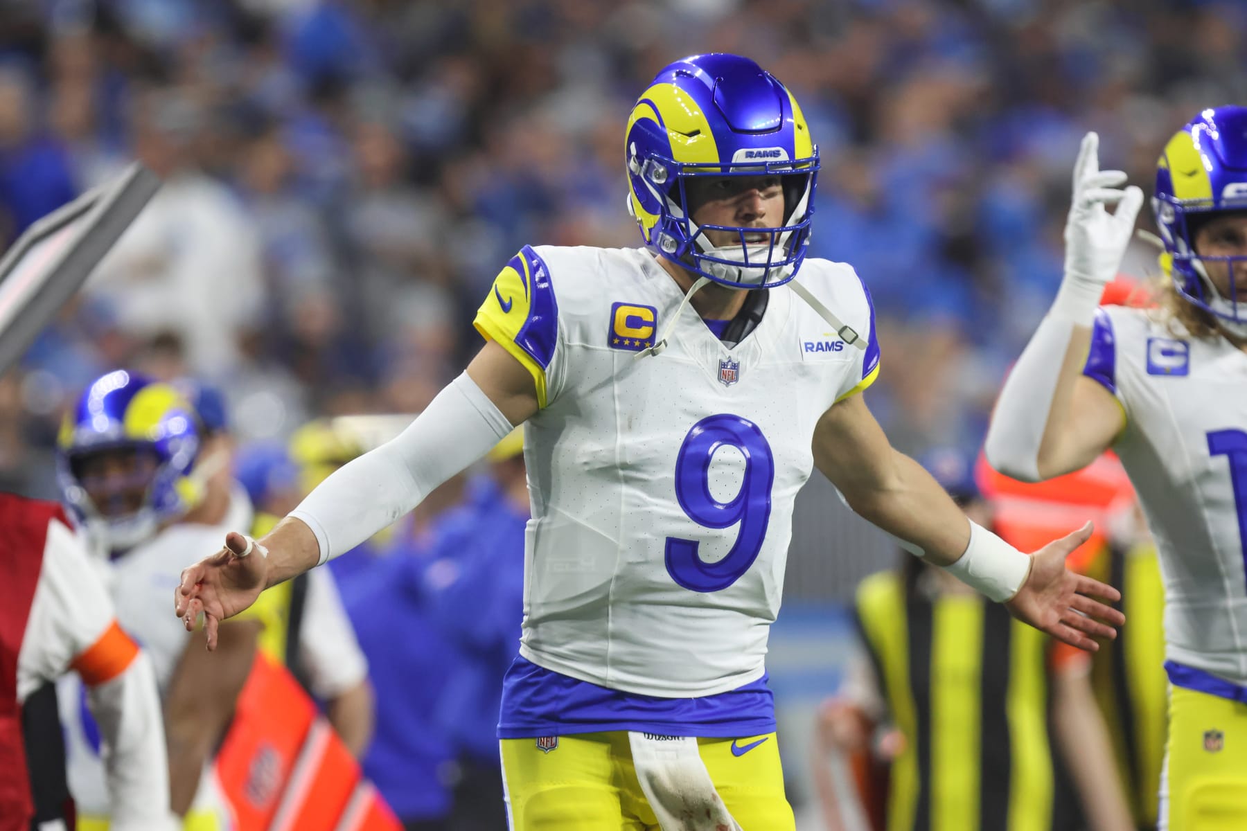DETROIT, MI - JANUARY 14:  Los Angeles Rams quarterback Matthew Stafford (9) waits to congratulate his teammates after a touchdown during an NFL NFC Wild Card playoff football game between the Los Angeles Rams and the Detroit Lions on January 14, 2024 at Ford Field in Detroit, Michigan.  (Photo by Scott W. Grau/Icon Sportswire via Getty Images)