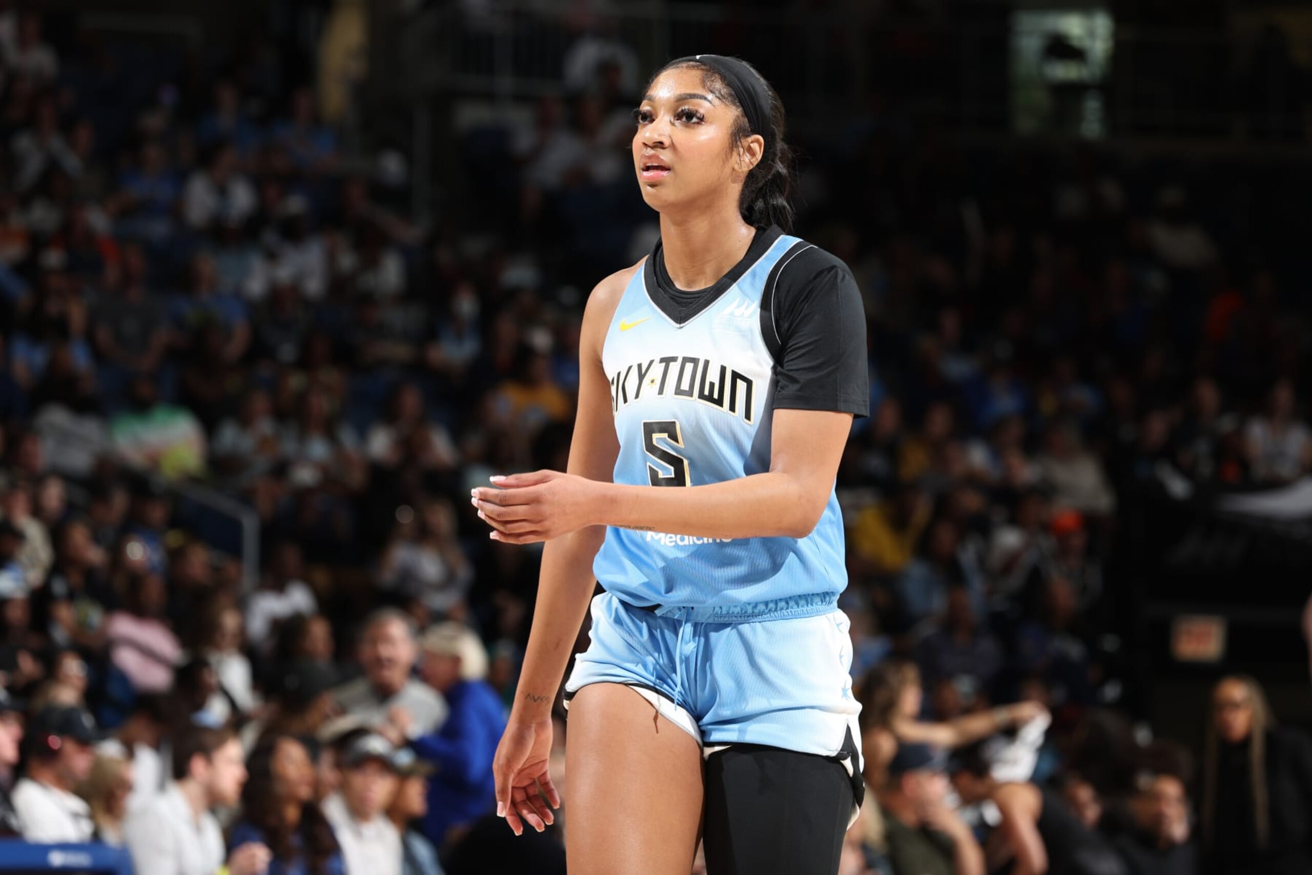 CHICAGO, IL -  MAY 25: Angel Reese #5 of the Chicago Sky looks on during the game against the Connecticut Sun on May 25, 2024 at the Wintrust Arena in Chicago, IL. NOTE TO USER: User expressly acknowledges and agrees that, by downloading and or using this photograph, User is consenting to the terms and conditions of the Getty Images License Agreement. Mandatory Copyright Notice: Copyright 2024 NBAE (Photo by Jeff Haynes/NBAE via Getty Images)