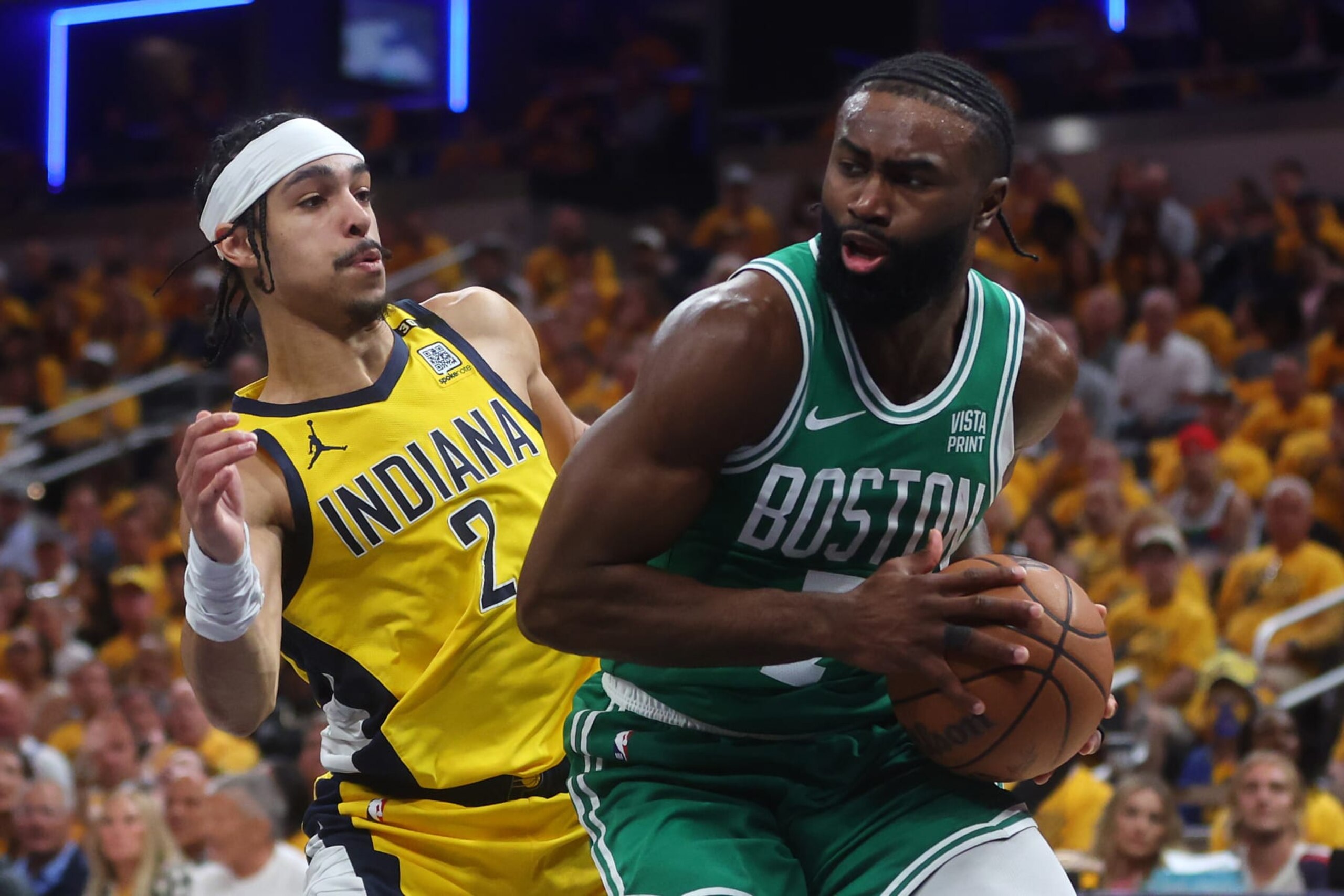 INDIANAPOLIS, INDIANA - MAY 25: Andrew Nembhard #2 of the Indiana Pacers defends Jaylen Brown #7 of the Boston Celtics during the first quarter in Game Three of the Eastern Conference Finals at Gainbridge Fieldhouse on May 25, 2024 in Indianapolis, Indiana. NOTE TO USER: User expressly acknowledges and agrees that, by downloading and or using this photograph, User is consenting to the terms and conditions of the Getty Images License Agreement. (Photo by Stacy Revere/Getty Images)