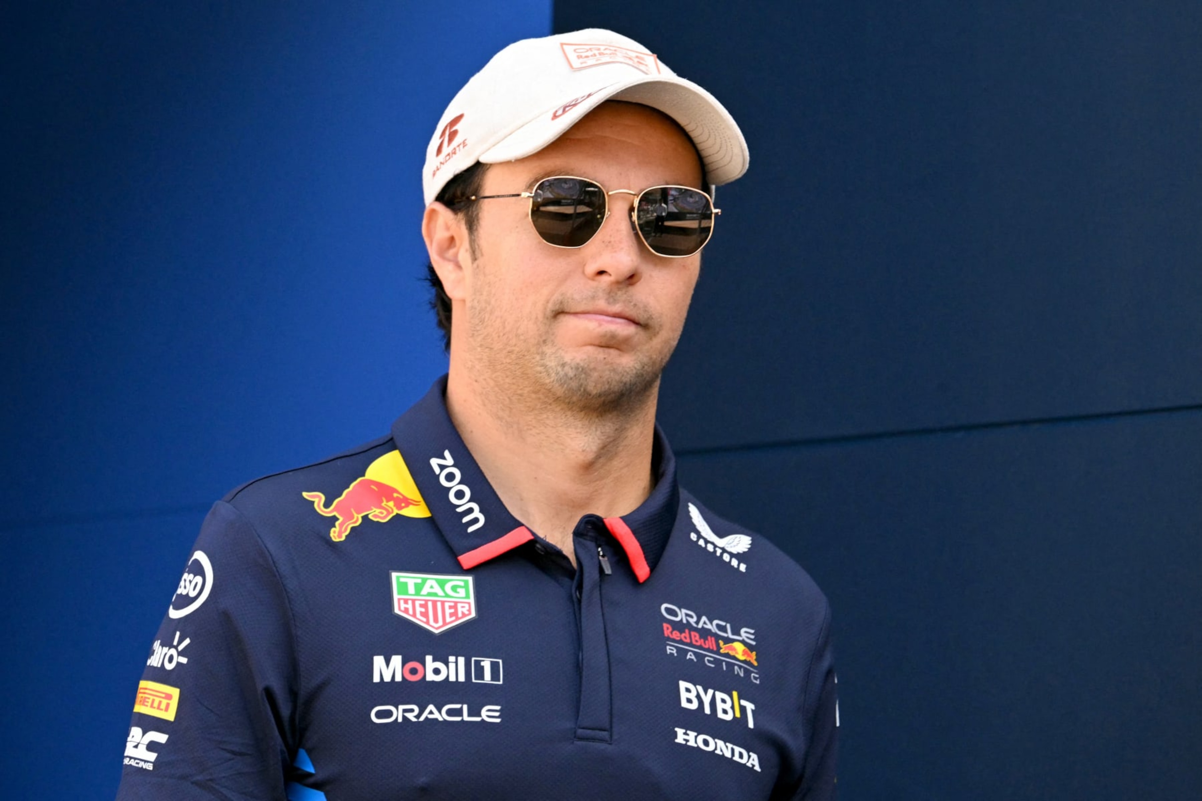 Red Bull Racing's Mexican driver Sergio Perez walks in the paddock ahead of the Formula One Monaco Grand Prix on May 26, 2024 at the Circuit de Monaco. (Photo by NICOLAS TUCAT / AFP) (Photo by NICOLAS TUCAT/AFP via Getty Images) Red Bull Racing's Mexican driver Sergio Perez walks in the paddock ahead of the Formula One Monaco Grand Prix on May 26, 2024 at the Circuit de Monaco. (Photo by NICOLAS TUCAT / AFP) (Photo by NICOLAS TUCAT/AFP via Getty Images)