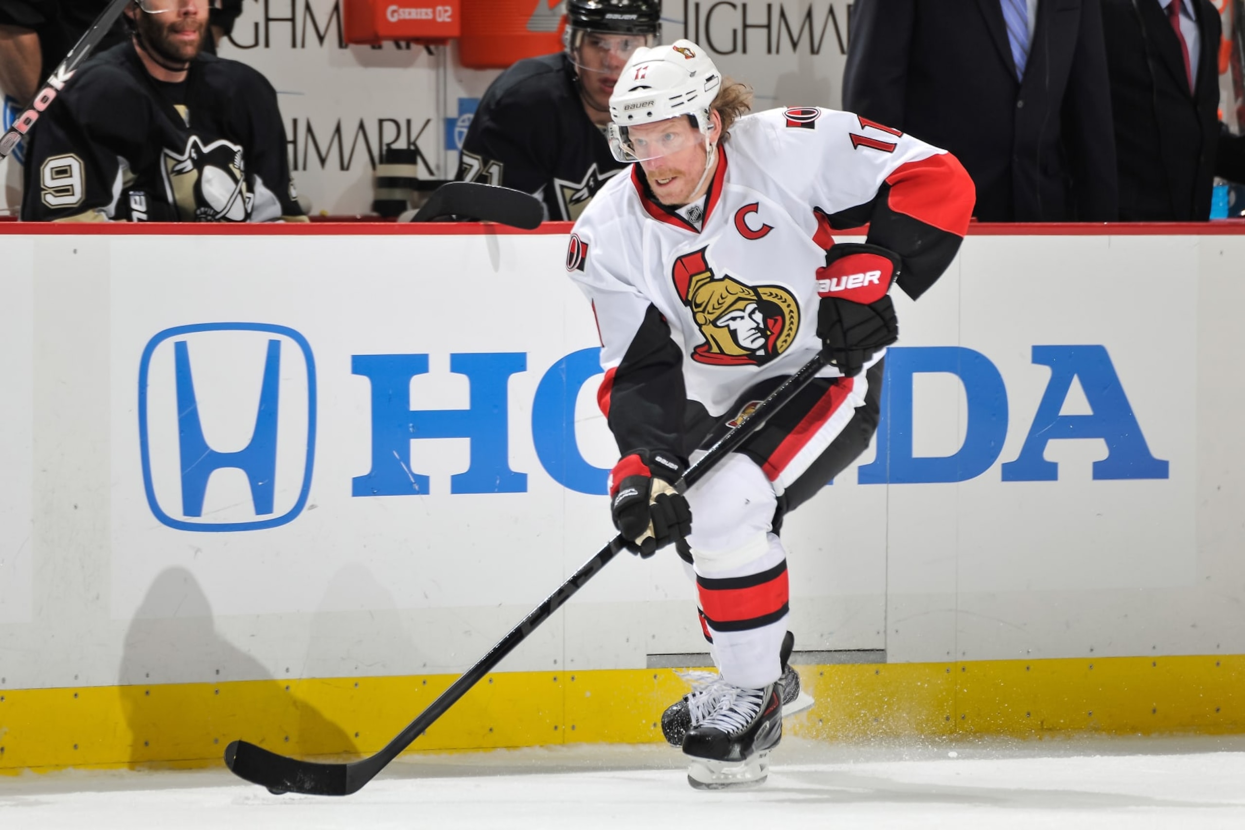 PITTSBURGH, PA - MAY 17:  Daniel Alfredsson #11 of the Ottawa Senators skates with the puck against the Pittsburgh Penguins in Game Two of the Eastern Conference Semifinals of the 2013 Stanley Cup Playoffs on May 17, 2013 at CONSOL Energy Center in Pittsburgh, Pennsylvania.  (Photo by Jamie Sabau/NHLI via Getty Images)
