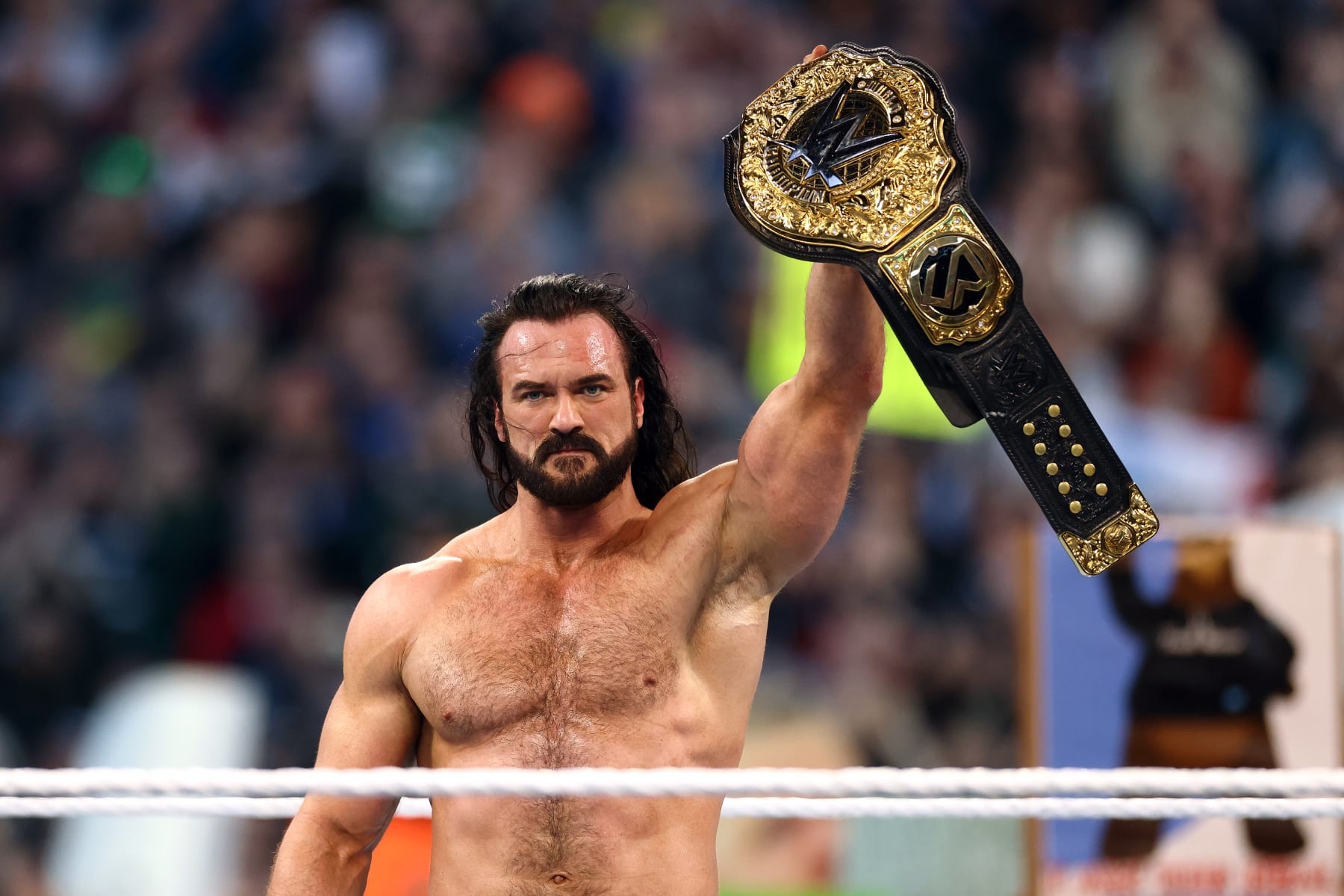 PHILADELPHIA, PENNSYLVANIA - APRIL 07: Drew McIntyre reacts after defeating Seth "Freakin" Rollins to win the WWE World Heavyweight Championship during Night Two at Lincoln Financial Field on April 07, 2024 in Philadelphia, Pennsylvania.  (Photo by Tim Nwachukwu/Getty Images)