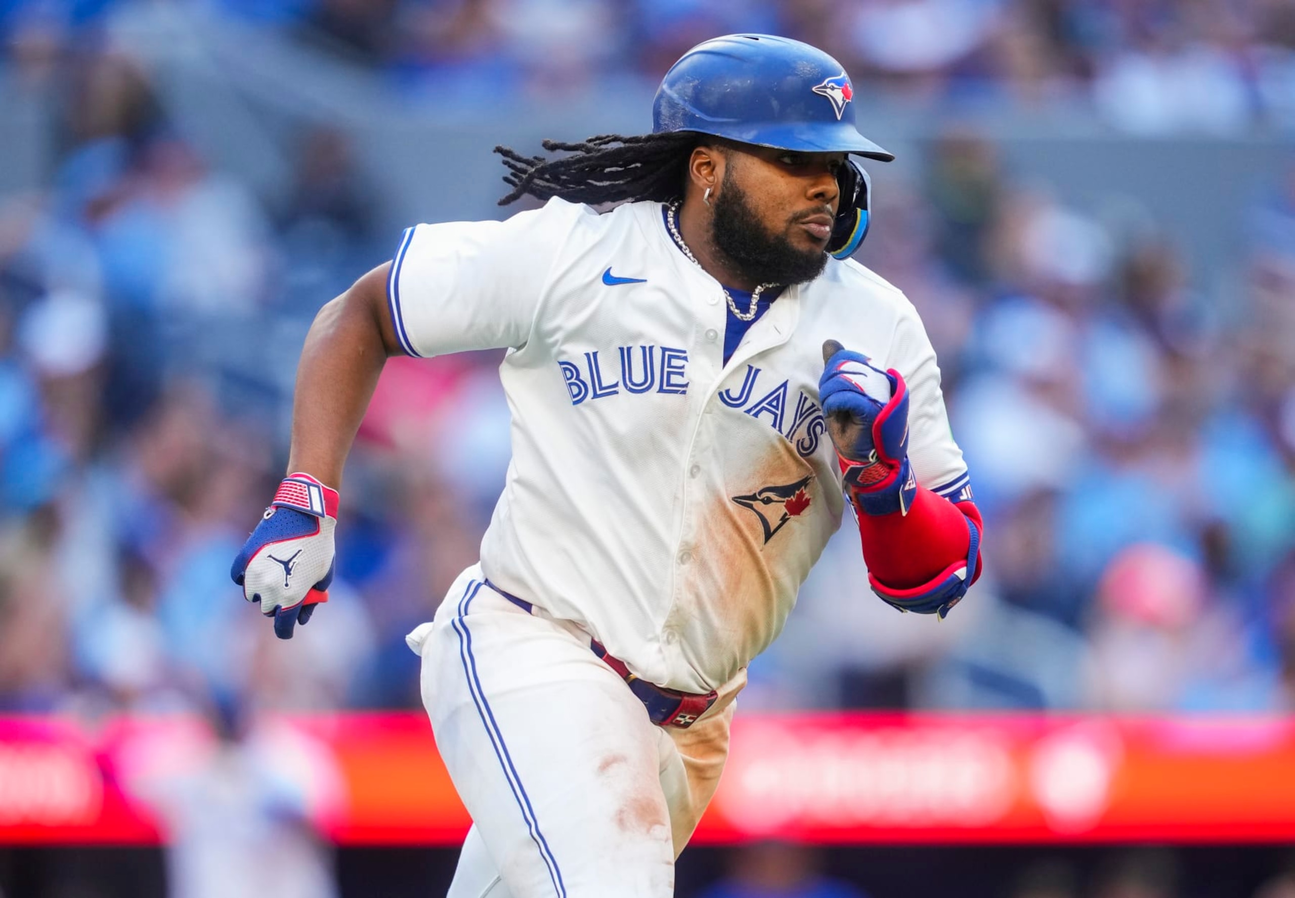 TORONTO, ON - MAY 18: Vladimir Guerrero Jr. #27 of Toronto Blue Jays hits a single against the Tampa Bay Rays during the eighth inning in their MLB game at the Rogers Centre on May 18, 2024 in Toronto, Ontario, Canada. (Photo by Mark Blinch/Getty Images)