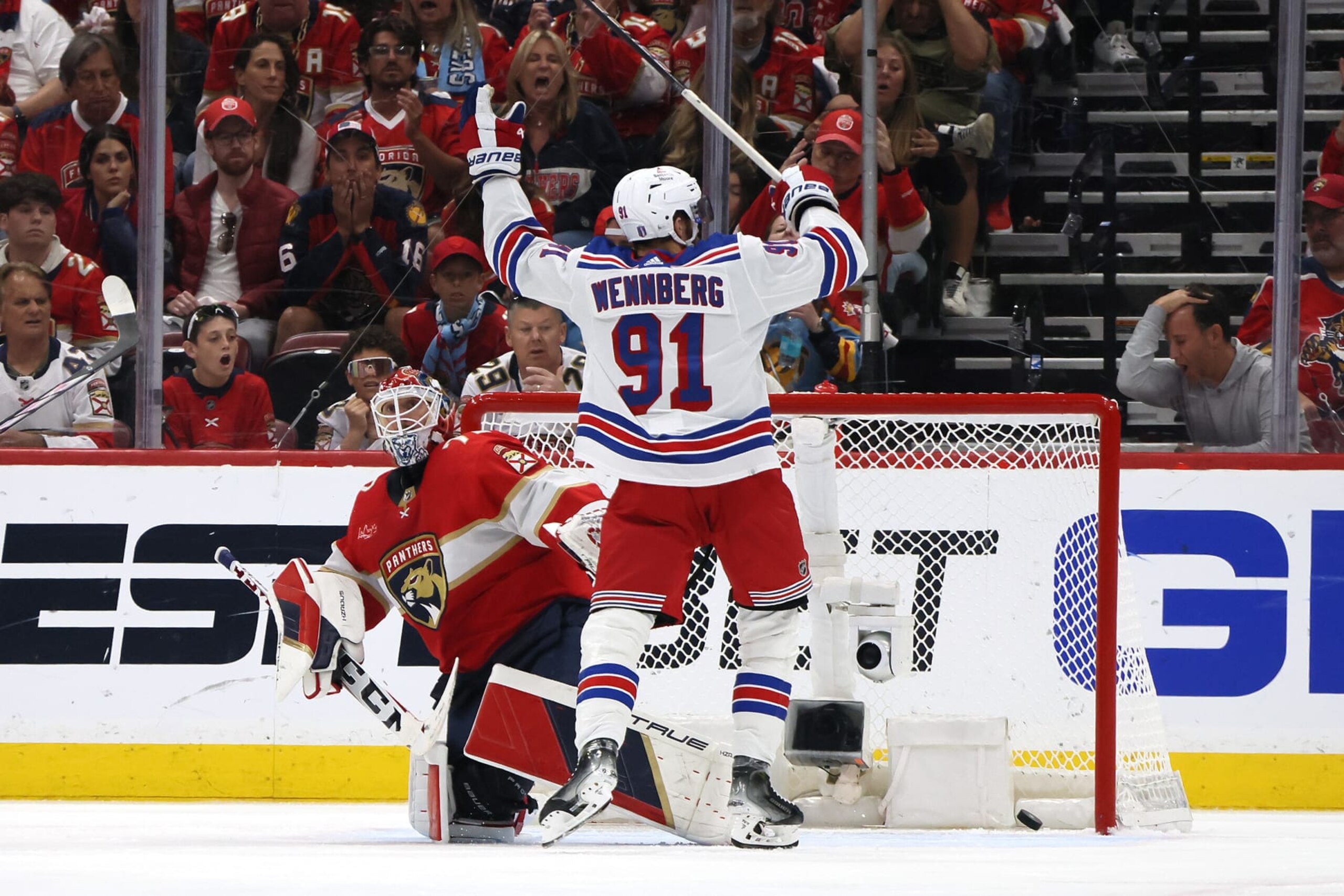 SUNRISE, FLORIDA - MAY 26: Alex Wennberg #91 of the New York Rangers scores the game winning goal against Sergei Bobrovsky #72 of the Florida Panthers during overtime in Game Three of the Eastern Conference Final of the 2024 Stanley Cup Playoffs at Amerant Bank Arena on May 26, 2024 in Sunrise, Florida. (Photo by Bruce Bennett/Getty Images)