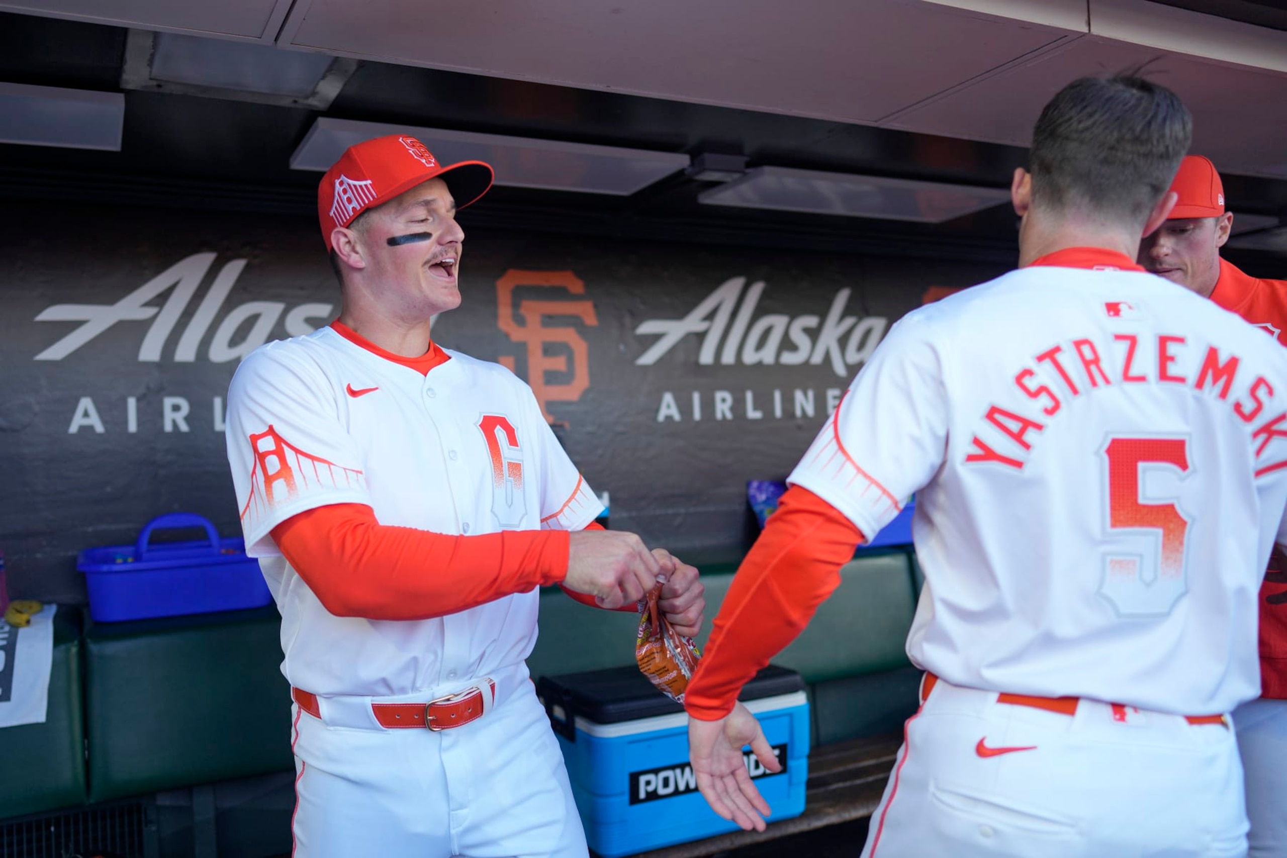 SAN FRANCISCO, CALIFORNIA - MAY 14: Matt Chapman #26 and Mike Yastrzemski #5 of the San Francisco Giants perform pregame rituals at Oracle Park on May 14, 2024 in San Francisco, California. (Photo by Suzanna Mitchell/San Francisco Giants/Getty Images)