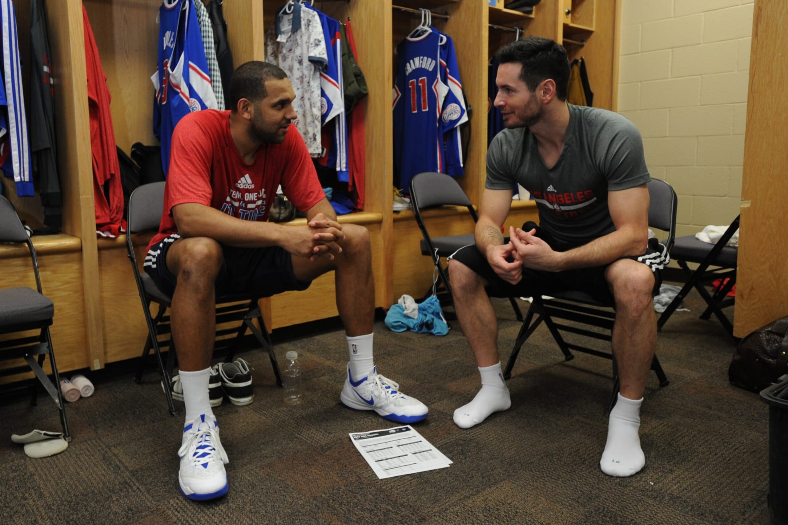 OKLAHOMA CITY, OK - MAY 13: Jared Dudley #9 and J.J. Redick #4 of the Los Angeles Clippers converse in the locker room before Game Five of the Western Conference Semifinals against the Oklahoma City Thunder during the 2014 NBA Playoffs on May 13, 2014 at the Chesapeake Energy Arena in Oklahoma City, Oklahoma. NOTE TO USER: User expressly acknowledges and agrees that, by downloading and or using this Photograph, user is consenting to the terms and conditions of the Getty Images License Agreement. Mandatory Copyright Notice: Copyright 2014 NBAE (Photo by Andrew D. Bernstein/NBAE via Getty Images) OKLAHOMA CITY, OK - MAY 13: Jared Dudley #9 and J.J. Redick #4 of the Los Angeles Clippers converse in the locker room before Game Five of the Western Conference Semifinals against the Oklahoma City Thunder during the 2014 NBA Playoffs on May 13, 2014 at the Chesapeake Energy Arena in Oklahoma City, Oklahoma. NOTE TO USER: User expressly acknowledges and agrees that, by downloading and or using this Photograph, user is consenting to the terms and conditions of the Getty Images License Agreement. Mandatory Copyright Notice: Copyright 2014 NBAE (Photo by Andrew D. Bernstein/NBAE via Getty Images)