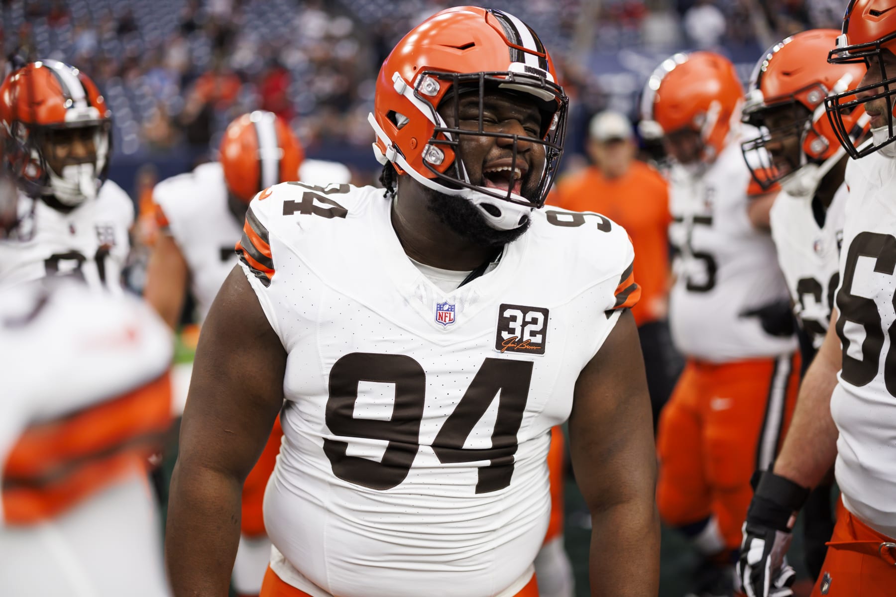 HOUSTON, TEXAS - JANUARY 13: Dalvin Tomlinson #94 of the Cleveland Browns is seen in the huddle during pregame warmups before an AFC wild-card playoff football game against the Houston Texans at NRG Stadium on January 13, 2024 in Houston, Texas. (Photo by Ryan Kang/Getty Images)