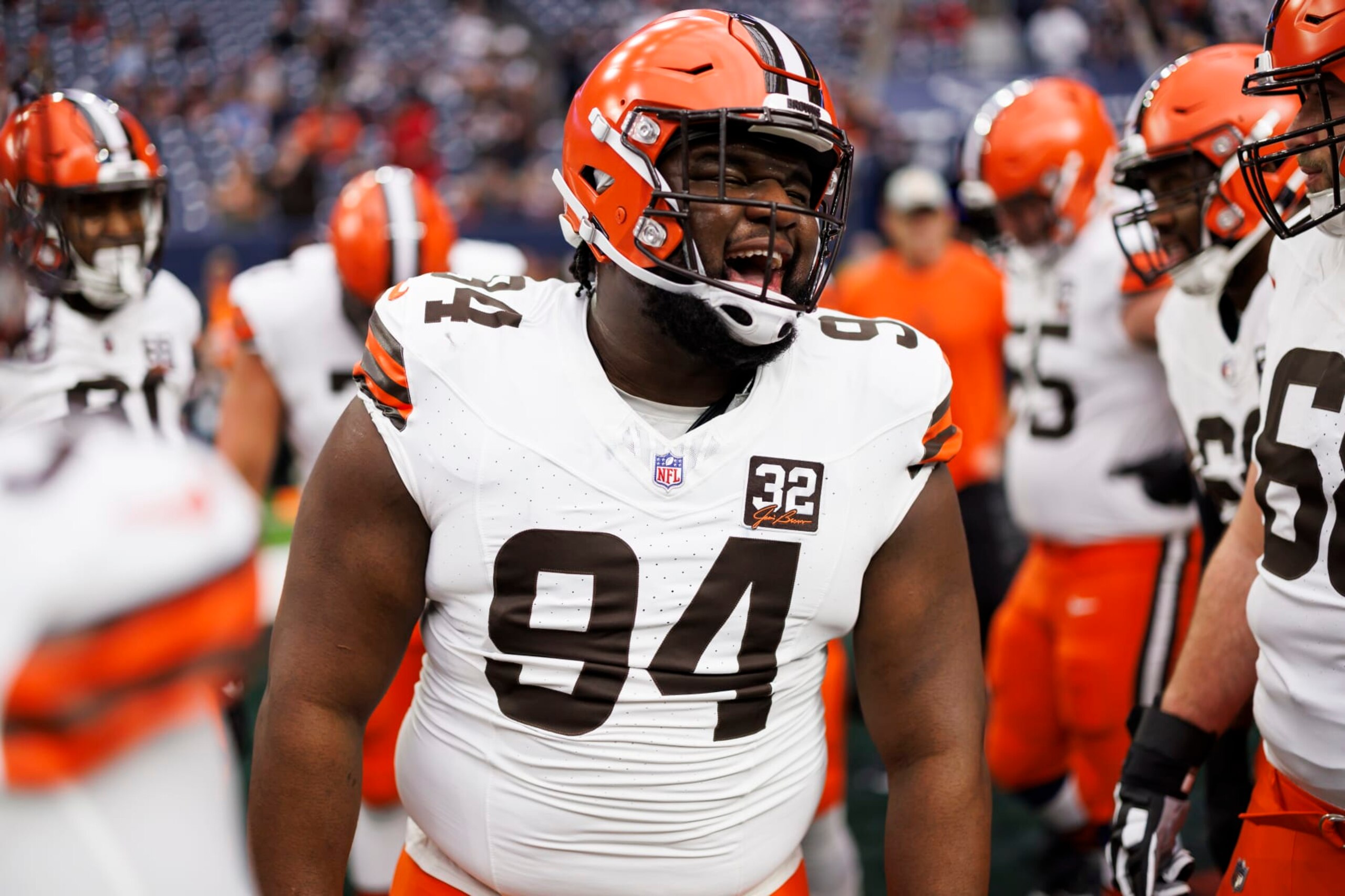 HOUSTON, TEXAS - JANUARY 13: Dalvin Tomlinson #94 of the Cleveland Browns is seen in the huddle during pregame warmups before an AFC wild-card playoff football game against the Houston Texans at NRG Stadium on January 13, 2024 in Houston, Texas. (Photo by Ryan Kang/Getty Images)