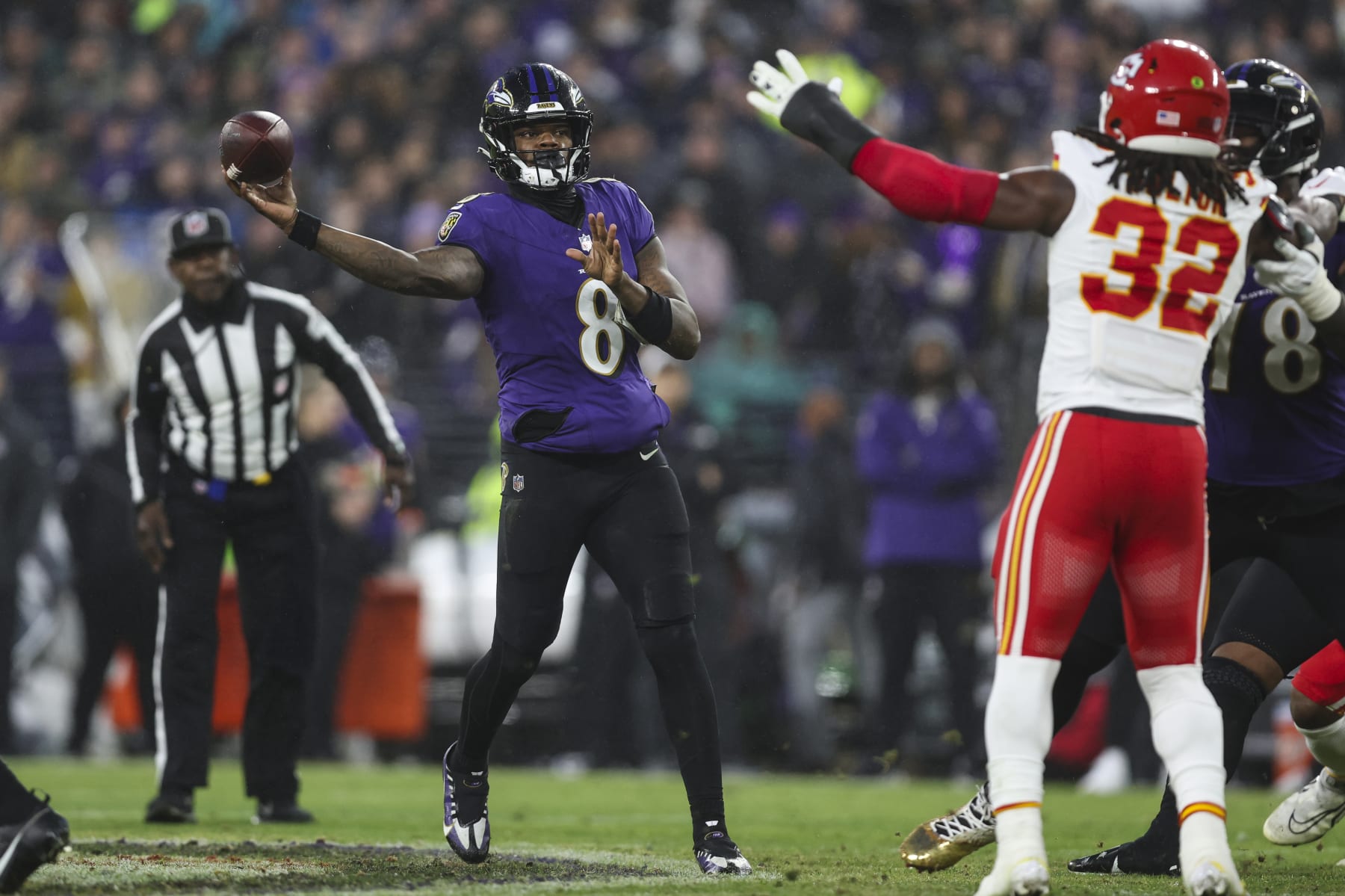 BALTIMORE, MD - JANUARY 28: Lamar Jackson #8 of the Baltimore Ravens throws the ball during the AFC Championship NFL football game against the Kansas City Chiefs at M&T Bank Stadium on January 28, 2024 in Baltimore, Maryland. (Photo by Perry Knotts/Getty Images)
