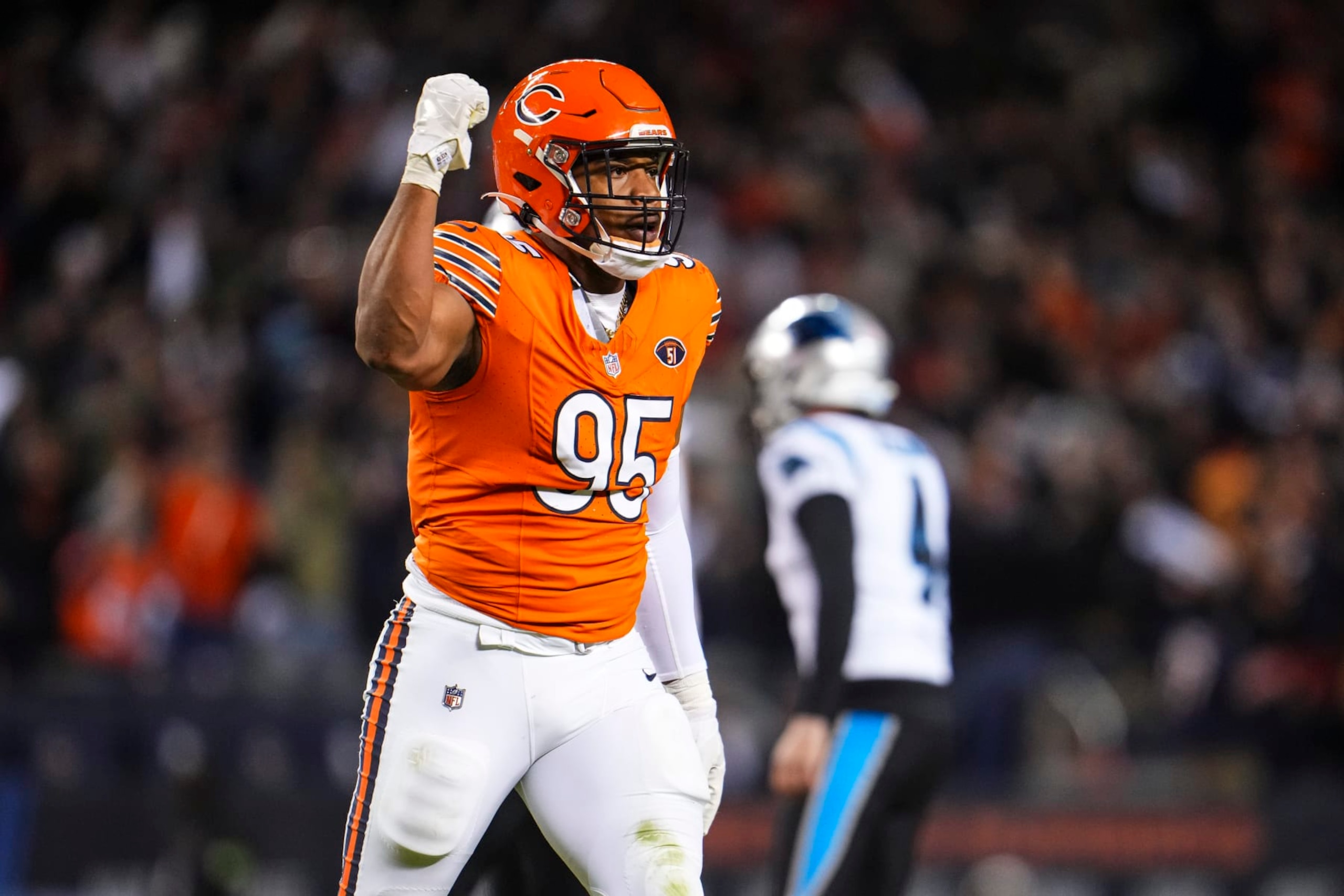 CHICAGO, IL - NOVEMBER 09: DeMarcus Walker #95 of the Chicago Bears celebrates during an NFL football game against the Carolina Panthers at Soldier Field on November 9, 2023 in Chicago, Illinois. (Photo by Cooper Neill/Getty Images) CHICAGO, IL - NOVEMBER 09: DeMarcus Walker #95 of the Chicago Bears celebrates during an NFL football game against the Carolina Panthers at Soldier Field on November 9, 2023 in Chicago, Illinois. (Photo by Cooper Neill/Getty Images)