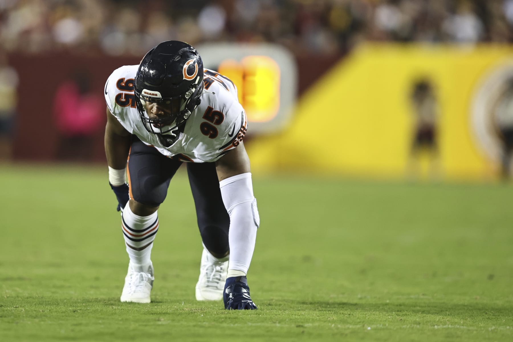 LANDOVER, MARYLAND - OCTOBER 05: DeMarcus Walker #95 of the Chicago Bears lines up during an NFL football game between the Washington Commanders and the Chicago Bears at FedExField on October 05, 2023 in Landover, Maryland. (Photo by Michael Owens/Getty Images)