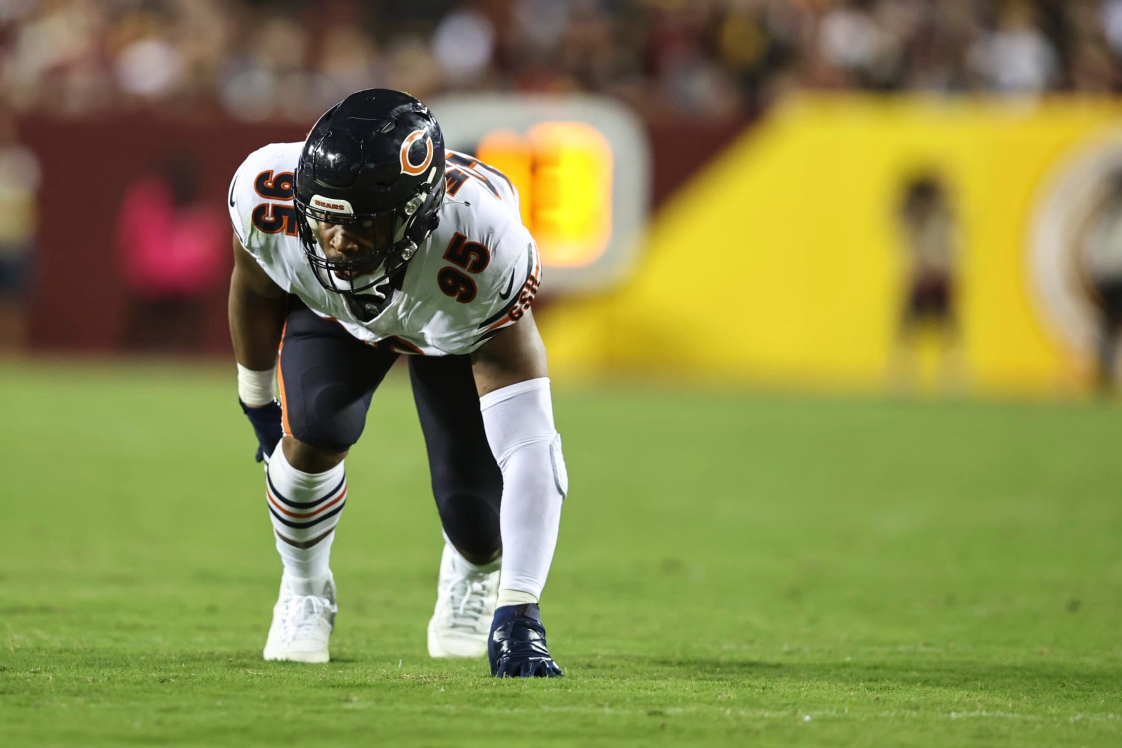 LANDOVER, MARYLAND - OCTOBER 05: DeMarcus Walker #95 of the Chicago Bears lines up during an NFL football game between the Washington Commanders and the Chicago Bears at FedExField on October 05, 2023 in Landover, Maryland. (Photo by Michael Owens/Getty Images)