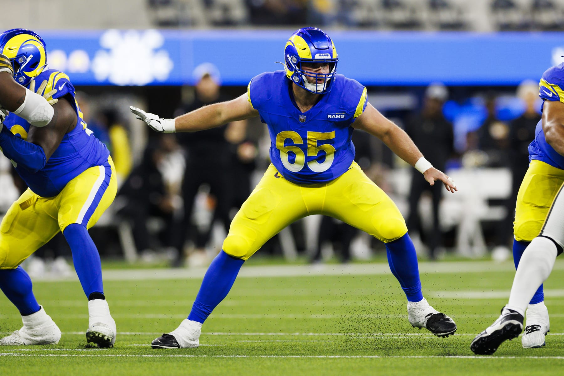 INGLEWOOD, CALIFORNIA - DECEMBER 21: Coleman Shelton #65 of the Los Angeles Rams blocks during a game against the New Orleans Saints at SoFi Stadium on December 21, 2023 in Inglewood, California. (Photo by Ric Tapia/Getty Images)