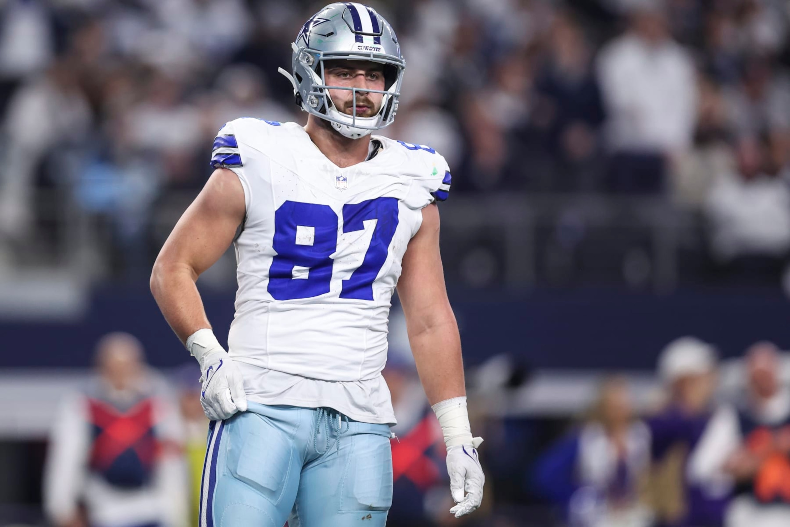 ARLINGTON, TX - JANUARY 14: Jake Ferguson #87 of the Dallas Cowboys looks on from the field during an NFL wild-card playoff football game against the Green Bay Packers at AT&T Stadium on January 14, 2024 in Arlington, Texas. (Photo by Perry Knotts/Getty Images) ARLINGTON, TX - JANUARY 14: Jake Ferguson #87 of the Dallas Cowboys looks on from the field during an NFL wild-card playoff football game against the Green Bay Packers at AT&T Stadium on January 14, 2024 in Arlington, Texas. (Photo by Perry Knotts/Getty Images)