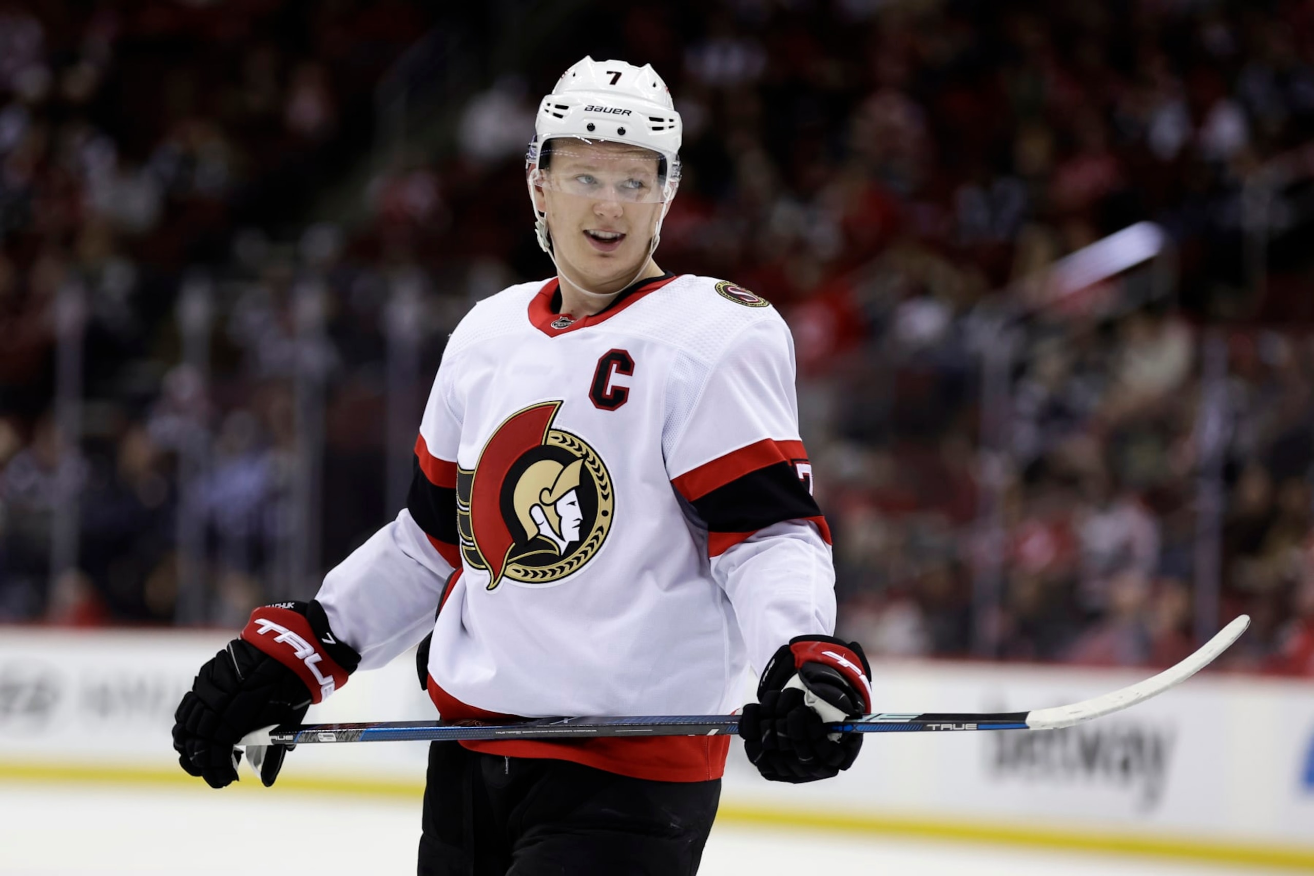 NEWARK, NEW JERSEY - MARCH 23: Brady Tkachuk #7 of the Ottawa Senators reacts during a break in play against the New Jersey Devils during the third period at the Prudential Center on March 23, 2024 in Newark, New Jersey. The Senators won 5-2. (Photo by Adam Hunger/Getty Images) NEWARK, NEW JERSEY - MARCH 23: Brady Tkachuk #7 of the Ottawa Senators reacts during a break in play against the New Jersey Devils during the third period at the Prudential Center on March 23, 2024 in Newark, New Jersey. The Senators won 5-2. (Photo by Adam Hunger/Getty Images)