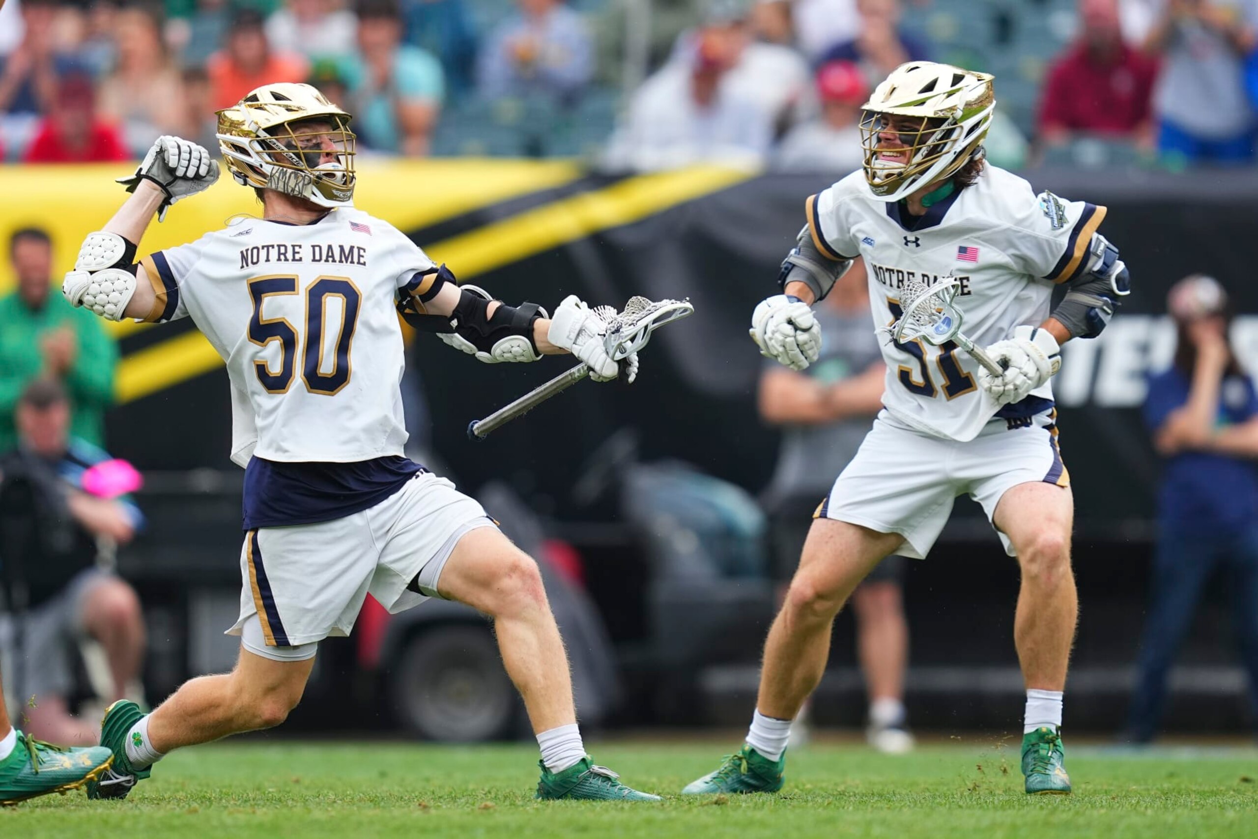 PHILADELPHIA, PENNSYLVANIA - MAY 27: Chris Kavanagh #50 of the Notre Dame Fighting Irish celebrates his goal along with Pat Kavanagh #51 against the Maryland Terrapins in the first half of the NCAA Division I Mens Lacrosse Championship game at Lincoln Financial Field on May 27, 2024 in Philadelphia, Pennsylvania.  (Photo by Mitchell Leff/Getty Images)