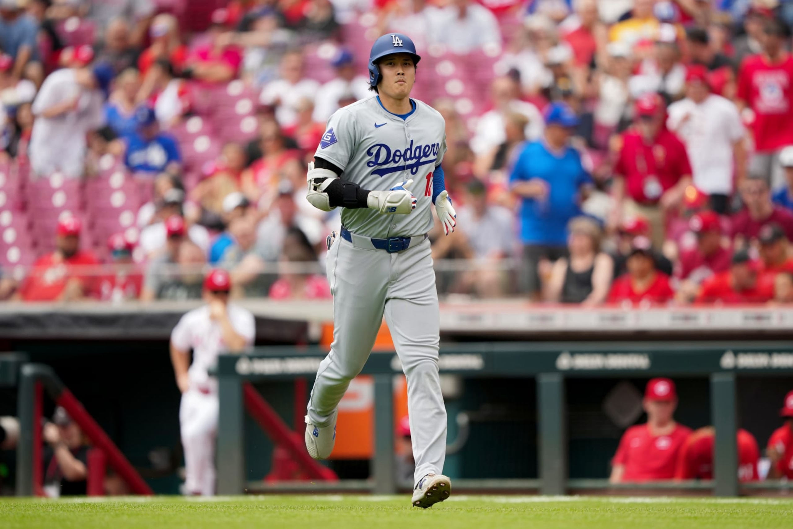 CINCINNATI, OHIO - MAY 26: Shohei Ohtani #17 of the Los Angeles Dodgers jogs across the field after grounding out in the first inning against the Cincinnati Reds at Great American Ball Park on May 26, 2024 in Cincinnati, Ohio. (Photo by Dylan Buell/Getty Images) CINCINNATI, OHIO - MAY 26: Shohei Ohtani #17 of the Los Angeles Dodgers jogs across the field after grounding out in the first inning against the Cincinnati Reds at Great American Ball Park on May 26, 2024 in Cincinnati, Ohio. (Photo by Dylan Buell/Getty Images)