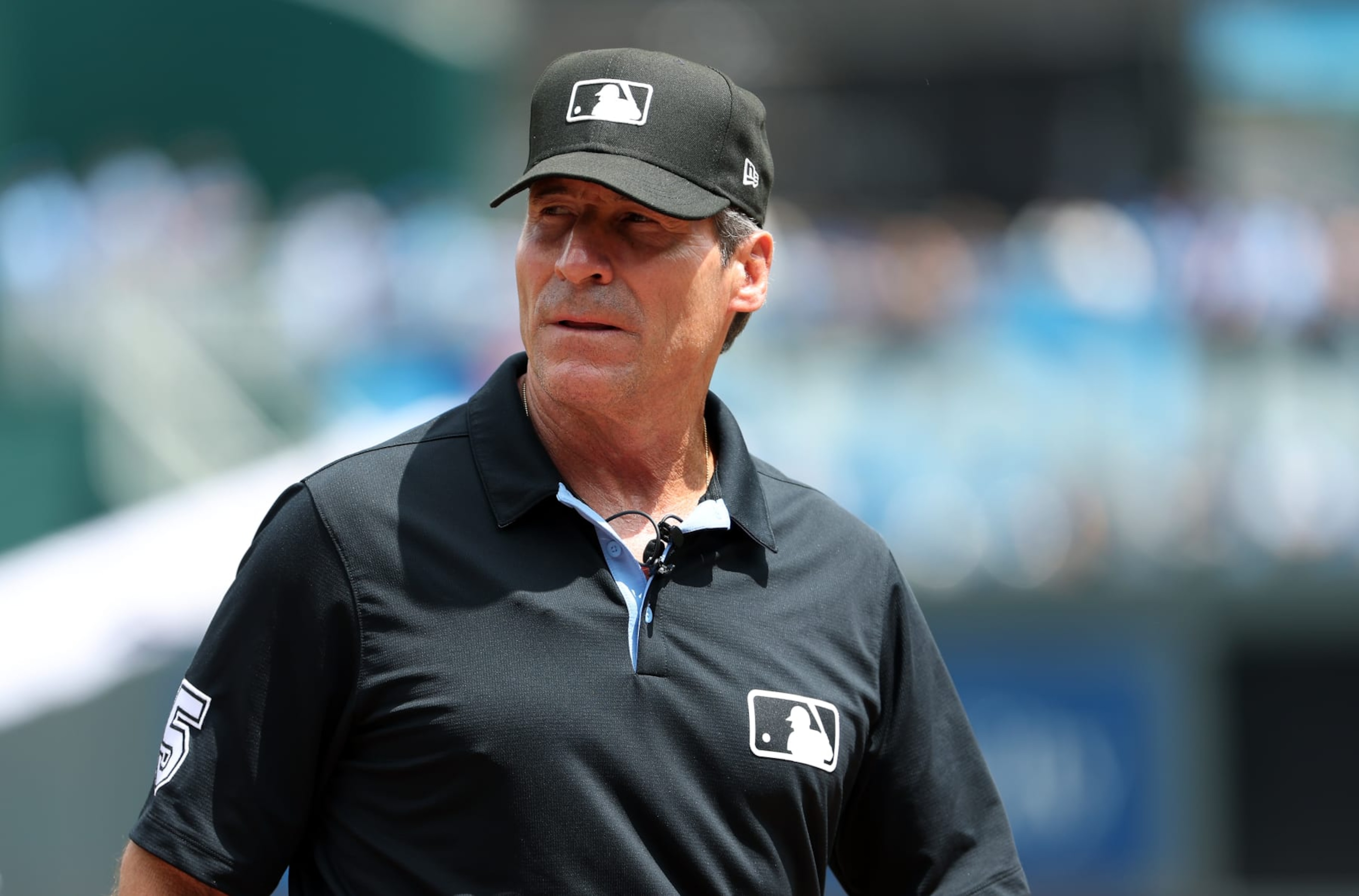 KANSAS CITY, MISSOURI - MAY 08:  Umpire Angel Hernandez #5 looks on prior to the game between the Milwaukee Brewers and the Kansas City Royals at Kauffman Stadium on May 08, 2024 in Kansas City, Missouri. (Photo by Jamie Squire/Getty Images)