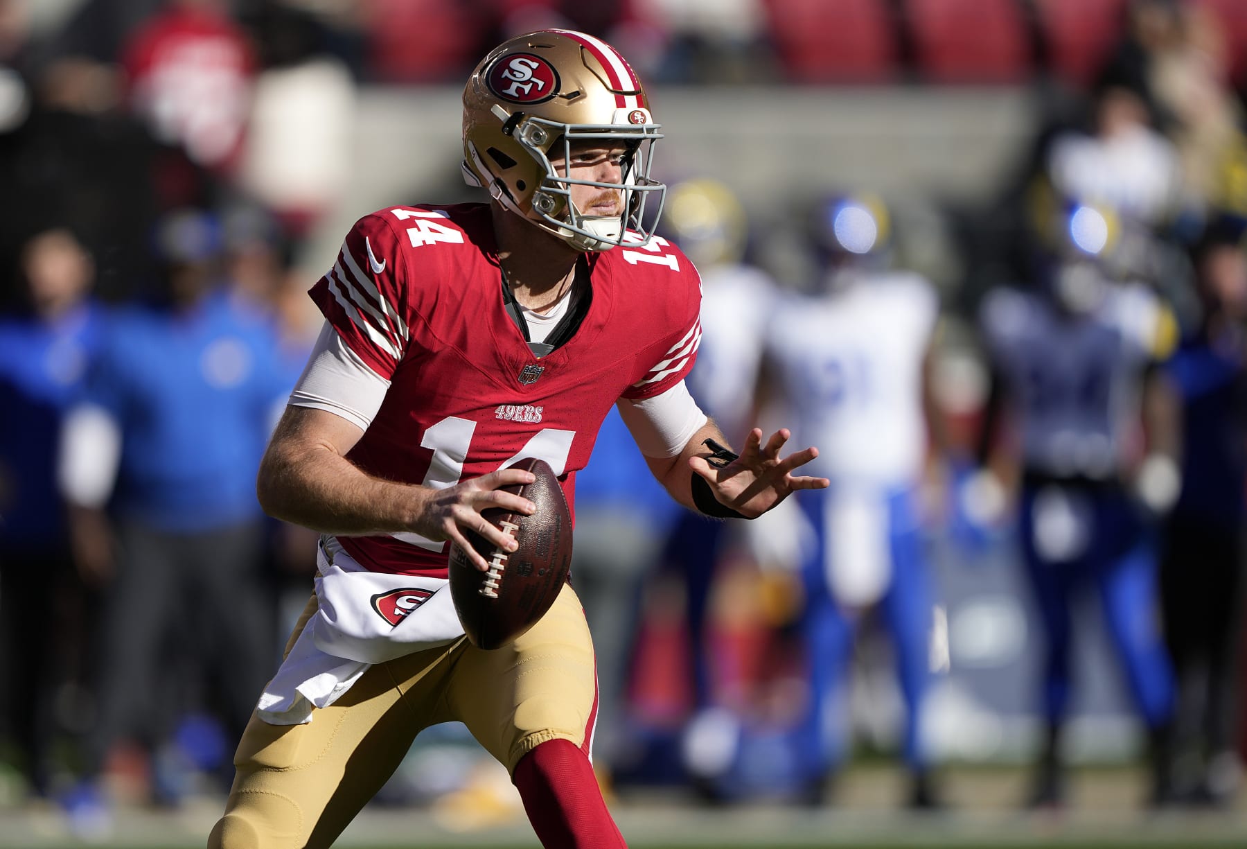 SANTA CLARA, CALIFORNIA - JANUARY 07: Sam Darnold #14 of the San Francisco 49ers looks to pass in the first half during a game against the Los Angeles Rams at Levi's Stadium on January 07, 2024 in Santa Clara, California. (Photo by Thearon W. Henderson/Getty Images)
