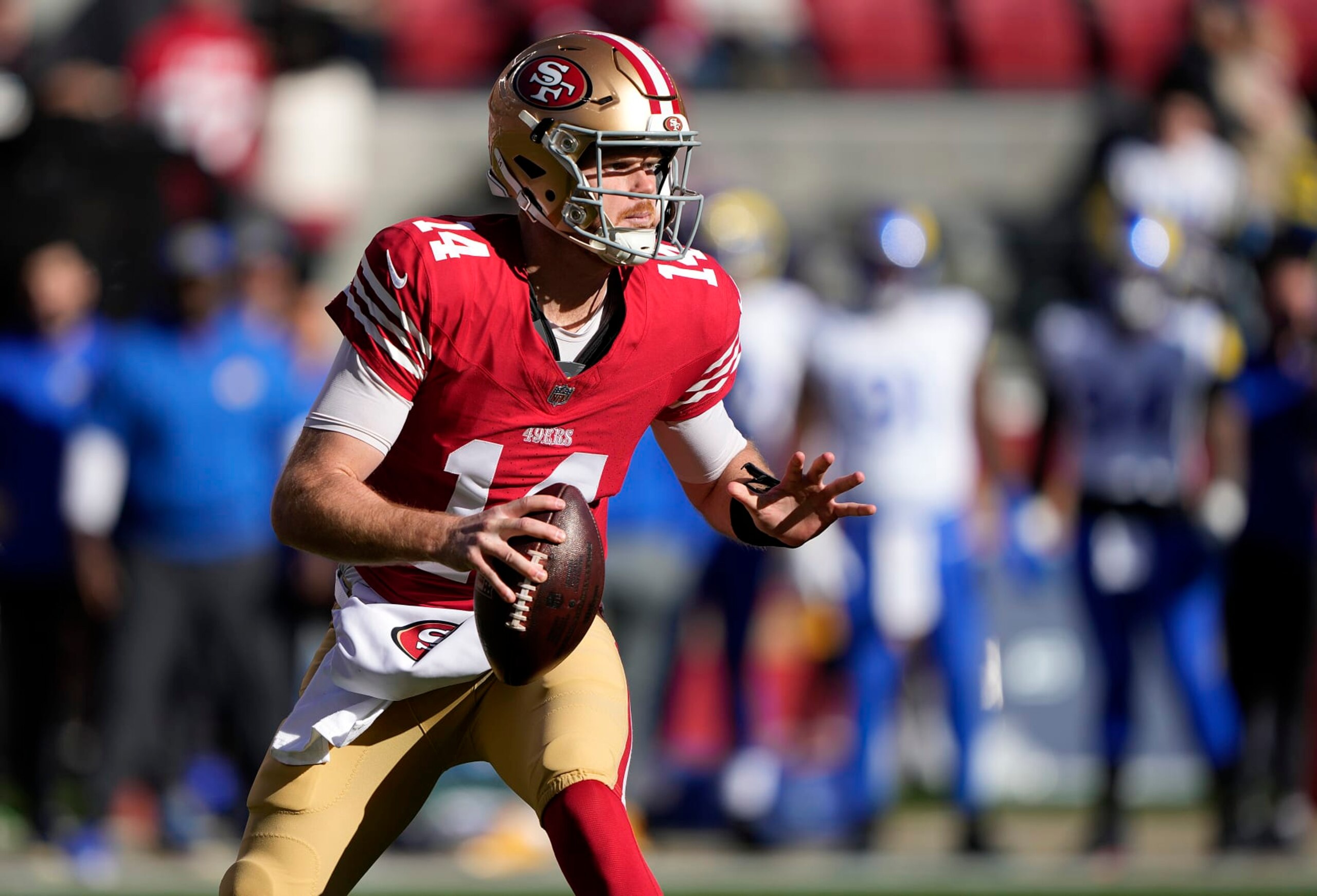 SANTA CLARA, CALIFORNIA - JANUARY 07: Sam Darnold #14 of the San Francisco 49ers looks to pass in the first half during a game against the Los Angeles Rams at Levi's Stadium on January 07, 2024 in Santa Clara, California. (Photo by Thearon W. Henderson/Getty Images)