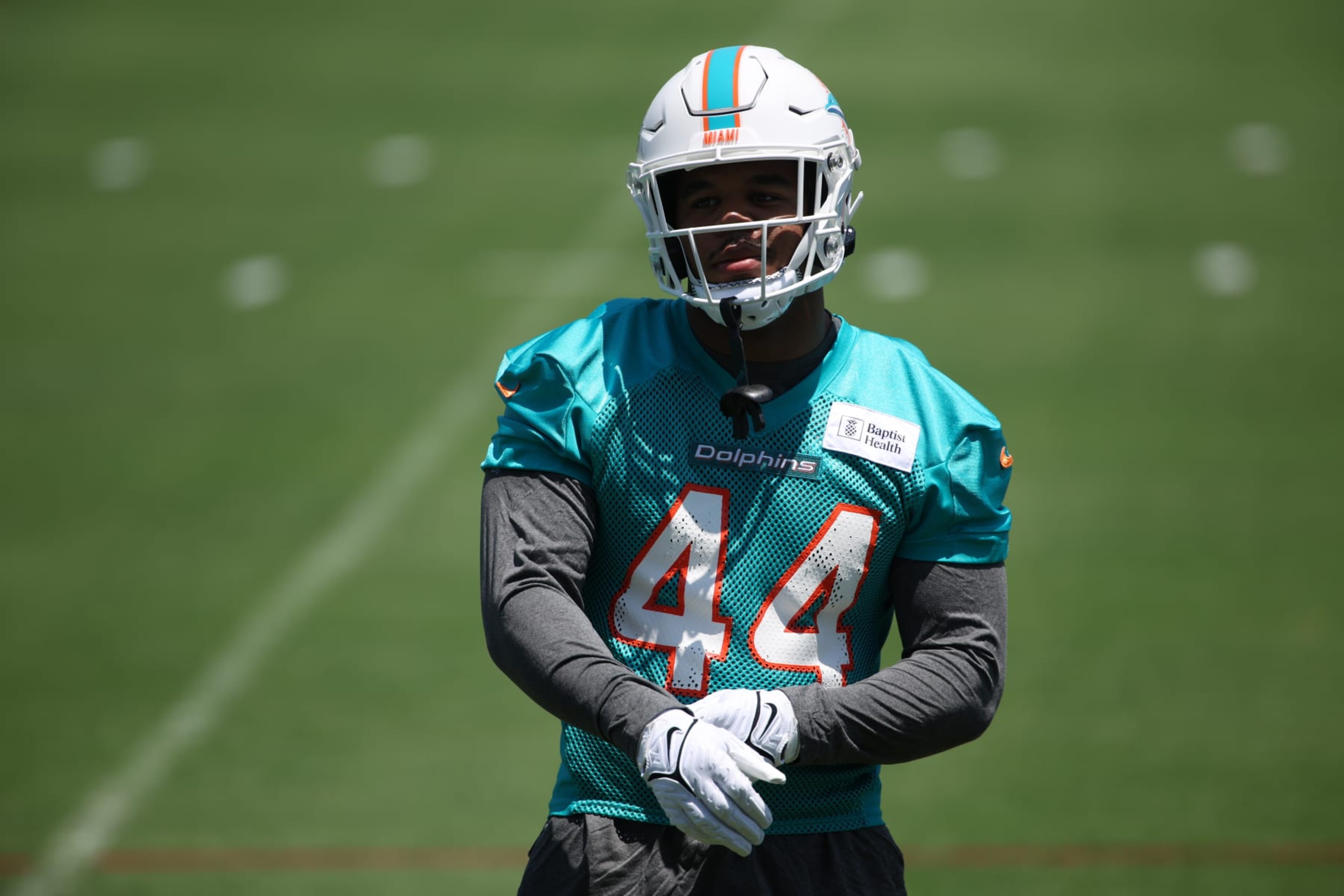 MAMII GARDNES, FL - MAY 10: Miami Dolphin draft pick Chop Robinson (44) runs drills during the Miami Dolphins Rookie Mini Camp on Friday. May 10, 2024 at Baptist Health Training Complex in Miami Gardens, Fla. (Photo by Peter Joneleit/Icon Sportswire via Getty Images) MAMII GARDNES, FL - MAY 10: Miami Dolphin draft pick Chop Robinson (44) runs drills during the Miami Dolphins Rookie Mini Camp on Friday. May 10, 2024 at Baptist Health Training Complex in Miami Gardens, Fla. (Photo by Peter Joneleit/Icon Sportswire via Getty Images)