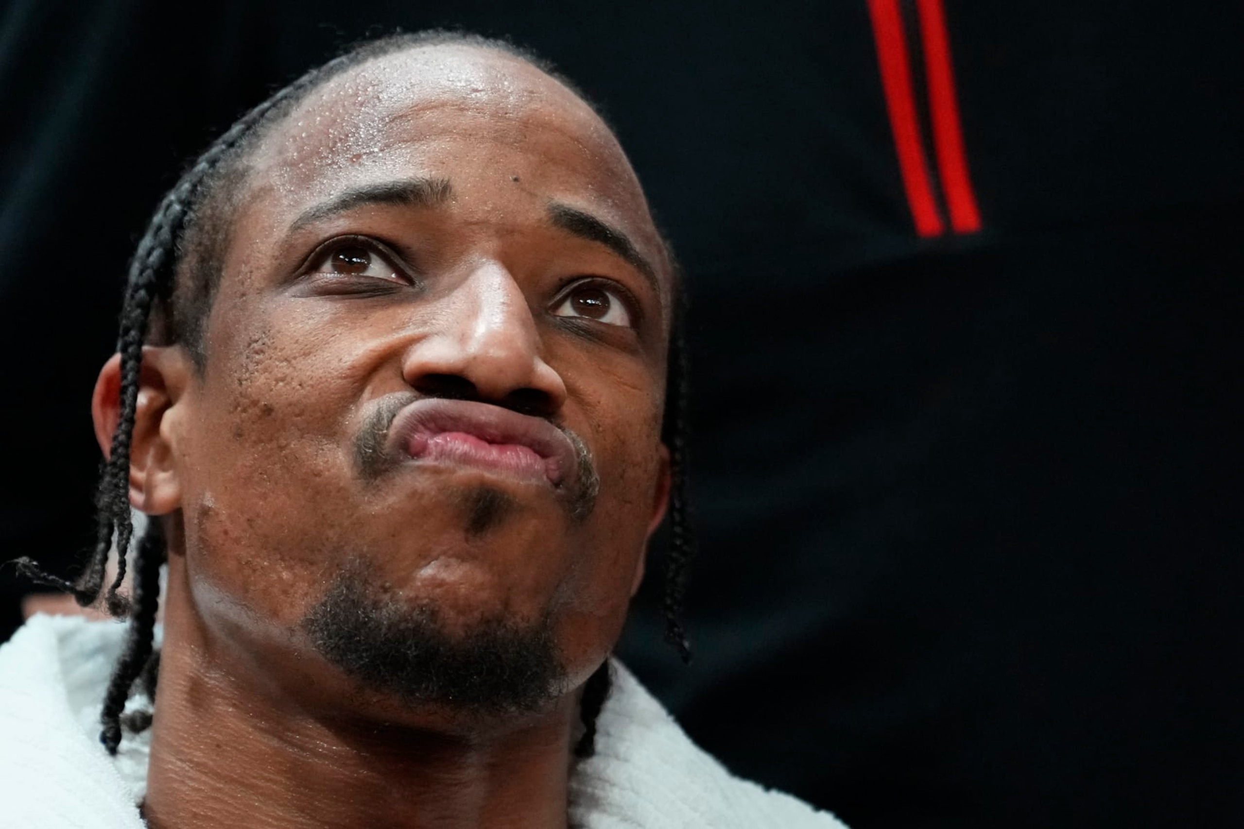 MIAMI, FLORIDA - APRIL 19: DeMar DeRozan #11 of the Chicago Bulls looks on against the Miami Heat in the fourth quarter during the Play-In Tournament at Kaseya Center on April 19, 2024 in Miami, Florida. NOTE TO USER: User expressly acknowledges and agrees that, by downloading and or using this photograph, User is consenting to the terms and conditions of the Getty Images License Agreement. (Photo by Rich Storry/Getty Images)