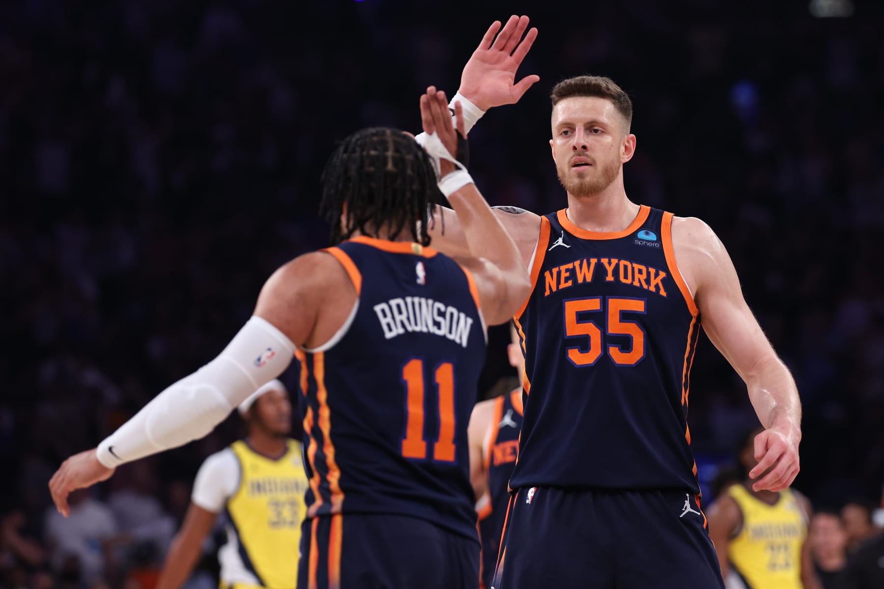 NEW YORK, NEW YORK - MAY 08: Isaiah Hartenstein #55 high fives Jalen Brunson #11 of the New York Knicks during the first quarter against the Indiana Pacers in Game Two of the Eastern Conference Second Round Playoffs at Madison Square Garden on May 08, 2024 in New York City. NOTE TO USER: User expressly acknowledges and agrees that, by downloading and or using this photograph, User is consenting to the terms and conditions of the Getty Images License Agreement. (Photo by Elsa/Getty Images)