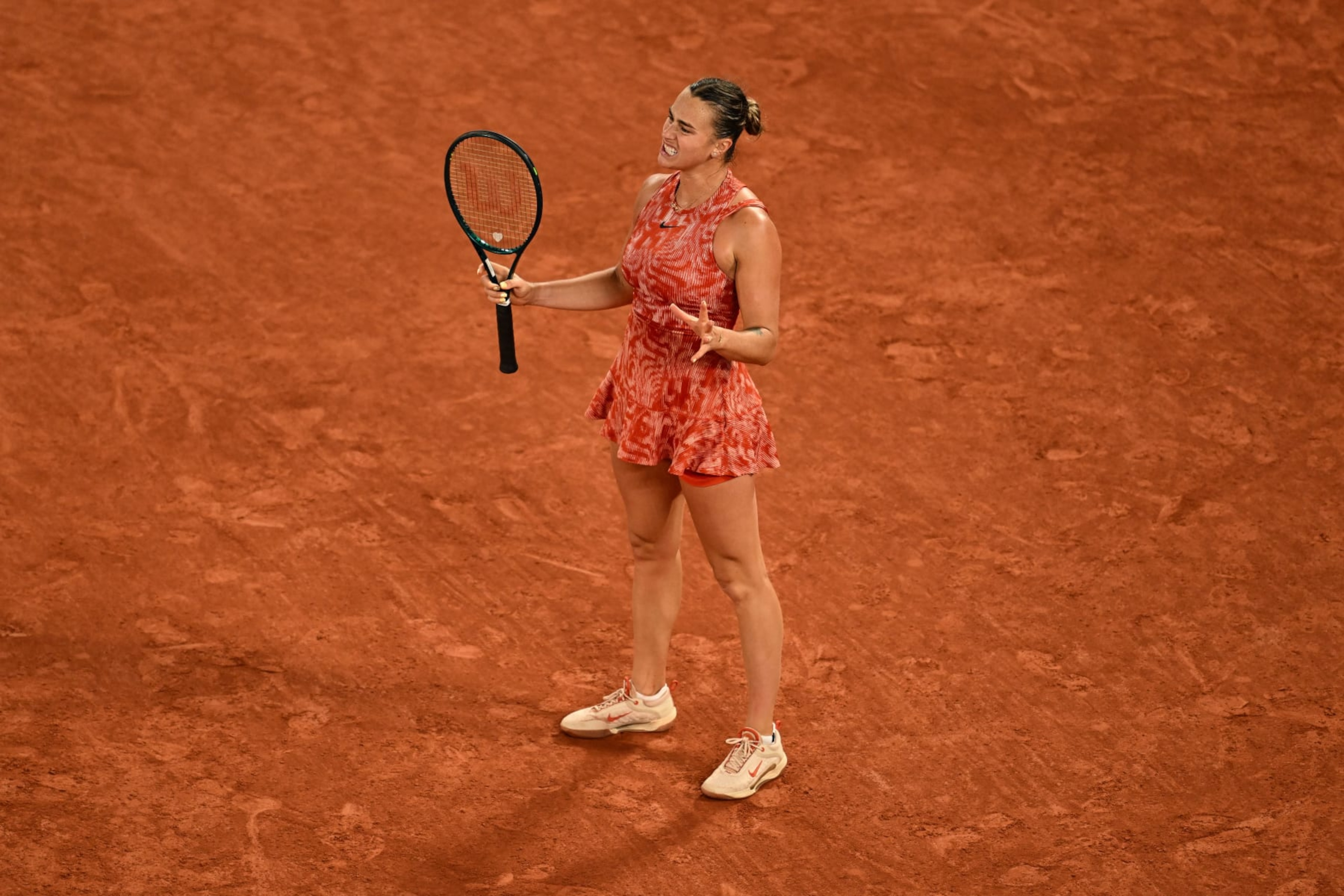 PARIS, FRANCE - MAY 28: Aryna Sabalenka of Belarus reacts against Erika Andreeva of Russia in the Women's Singles first round match on Day Three of the 2024 French Open at Roland Garros on May 28, 2024 in Paris, France. (Photo by Daniel Kopatsch/Getty Images)