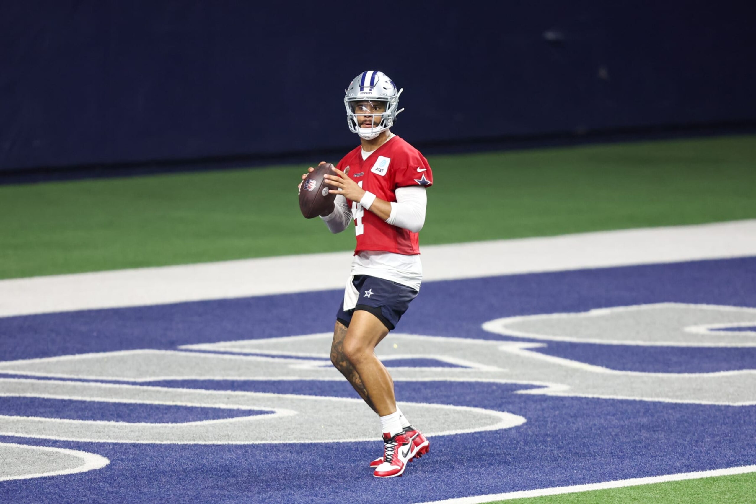 FRISCO, TX - MAY 22: Dallas Cowboys quarterback Dak Prescott (4) passes during the Dallas Cowboys OTAs on May 22, 2024 at The Star in Frisco, TX. (Photo by George Walker/Icon Sportswire via Getty Images) FRISCO, TX - MAY 22: Dallas Cowboys quarterback Dak Prescott (4) passes during the Dallas Cowboys OTAs on May 22, 2024 at The Star in Frisco, TX. (Photo by George Walker/Icon Sportswire via Getty Images)