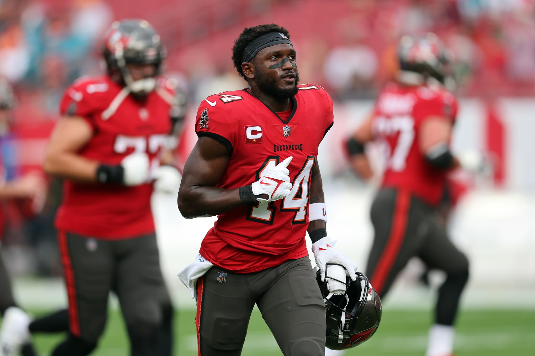 TAMPA, FLORIDA - DECEMBER 24:  Chris Godwin #14 of the Tampa Bay Buccaneers warms up prior to the game against the Jacksonville Jaguars at Raymond James Stadium on December 24, 2023 in Tampa, Florida. (Photo by Mike Carlson/Getty Images)