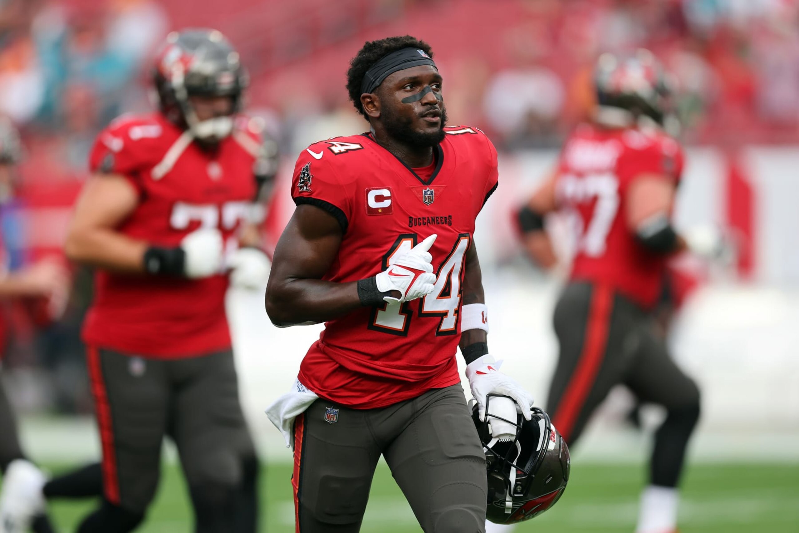 TAMPA, FLORIDA - DECEMBER 24:  Chris Godwin #14 of the Tampa Bay Buccaneers warms up prior to the game against the Jacksonville Jaguars at Raymond James Stadium on December 24, 2023 in Tampa, Florida. (Photo by Mike Carlson/Getty Images)