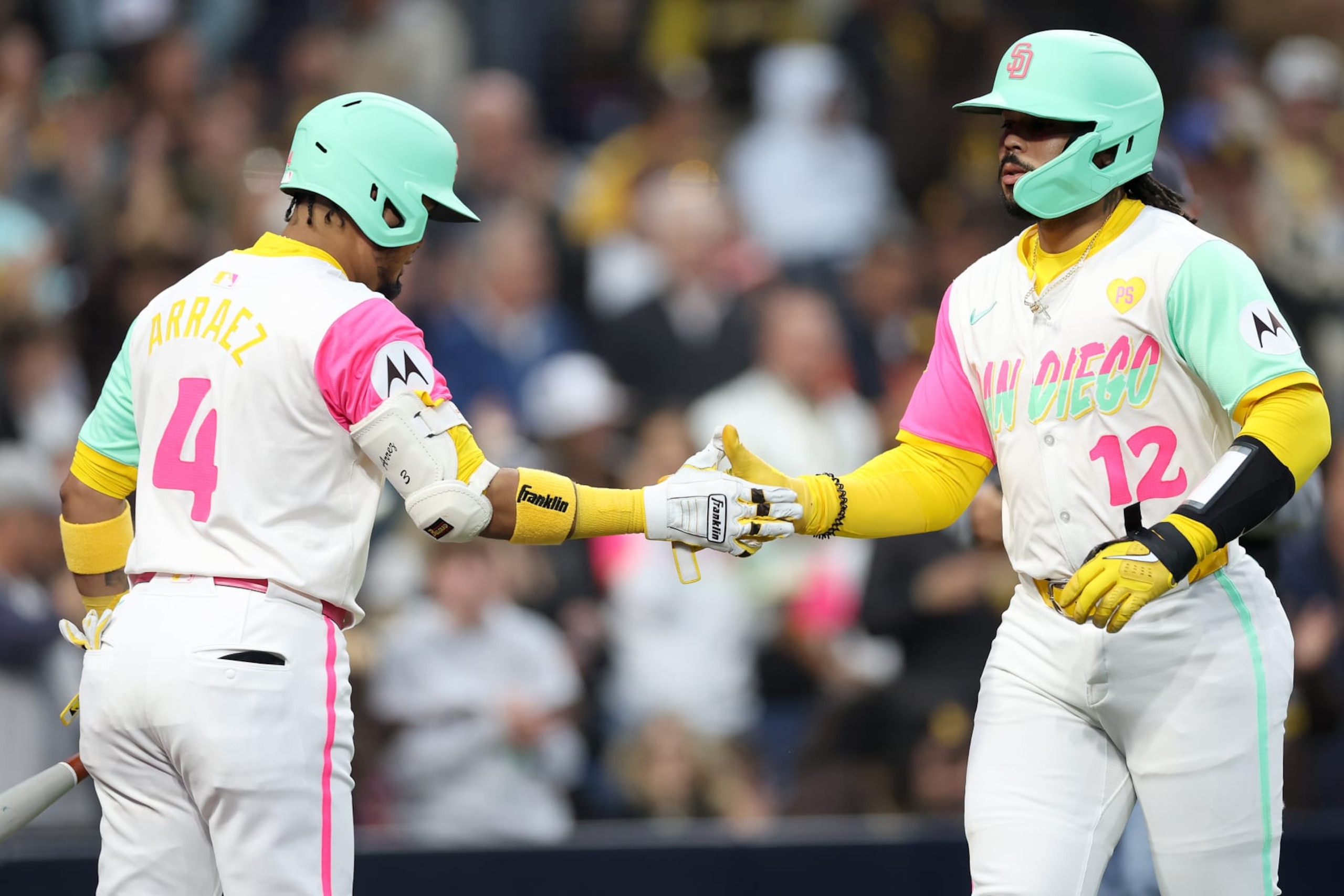 SAN DIEGO, CALIFORNIA - MAY 10: Luis Arraez #4 congratulates Luis Campusano #12 of the San Diego Padres after his solo homerun during the third inning of a game against the Los Angeles Dodgers at Petco Park on May 10, 2024 in San Diego, California. (Photo by Sean M. Haffey/Getty Images)