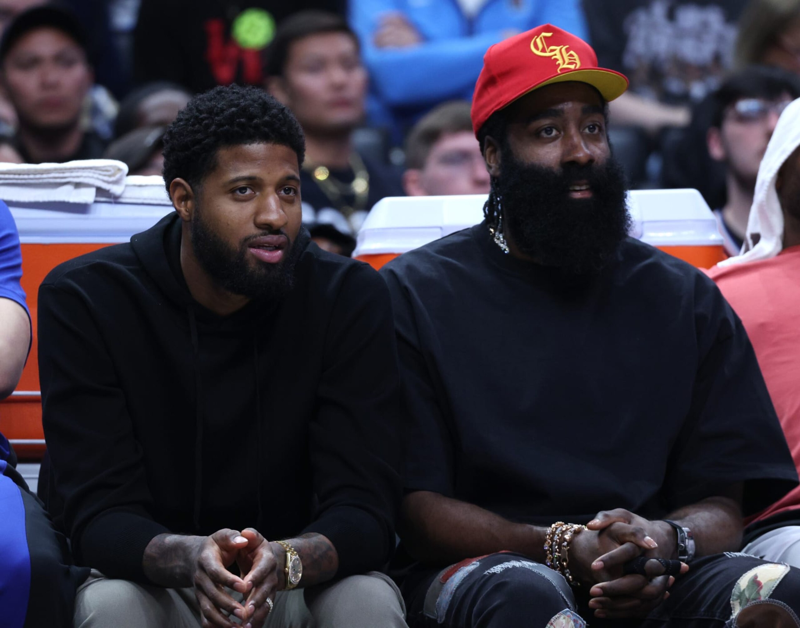 LOS ANGELES, CALIFORNIA - APRIL 10: Paul George #13 and James Harden #1 of the LA Clippers watch from the bench during a 124-108 loss to the Phoenix Suns at Crypto.com Arena on April 10, 2024 in Los Angeles, California. User is consenting to the terms and conditions of the Getty Images License Agreement. (Photo by Harry How/Getty Images) LOS ANGELES, CALIFORNIA - APRIL 10: Paul George #13 and James Harden #1 of the LA Clippers watch from the bench during a 124-108 loss to the Phoenix Suns at Crypto.com Arena on April 10, 2024 in Los Angeles, California. User is consenting to the terms and conditions of the Getty Images License Agreement. (Photo by Harry How/Getty Images)