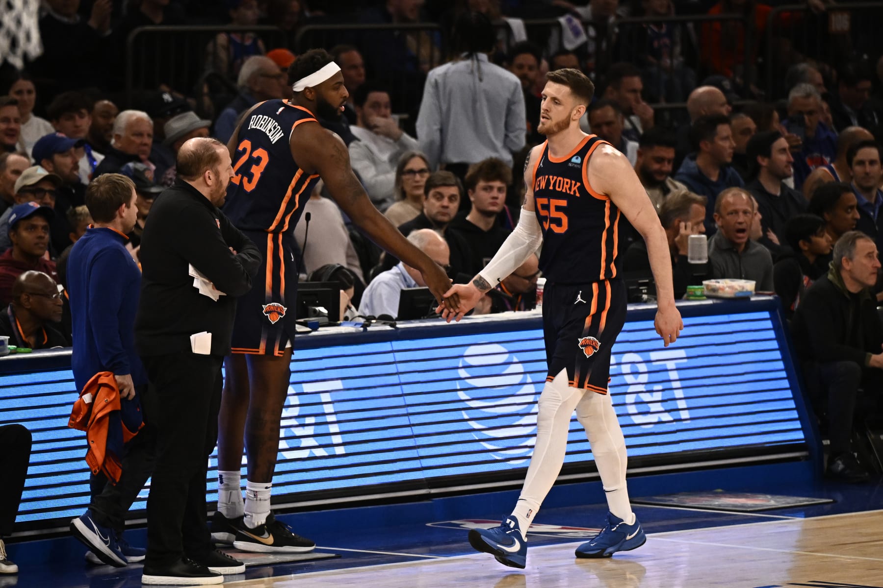 NEW YORK, NY - APRIL 22: Isaiah Hartenstein #55 and Mitchell Robinson #23 of the New York Knicks high five during the game against the Philadelphia 76ers during Round 1 Game 2 of the 2024 NBA Playoffs on April 22, 2024 at Madison Square Garden in New York City, New York.  NOTE TO USER: User expressly acknowledges and agrees that, by downloading and or using this photograph, User is consenting to the terms and conditions of the Getty Images License Agreement. Mandatory Copyright Notice: Copyright 2024 NBAE  (Photo by David Dow/NBAE via Getty Images)