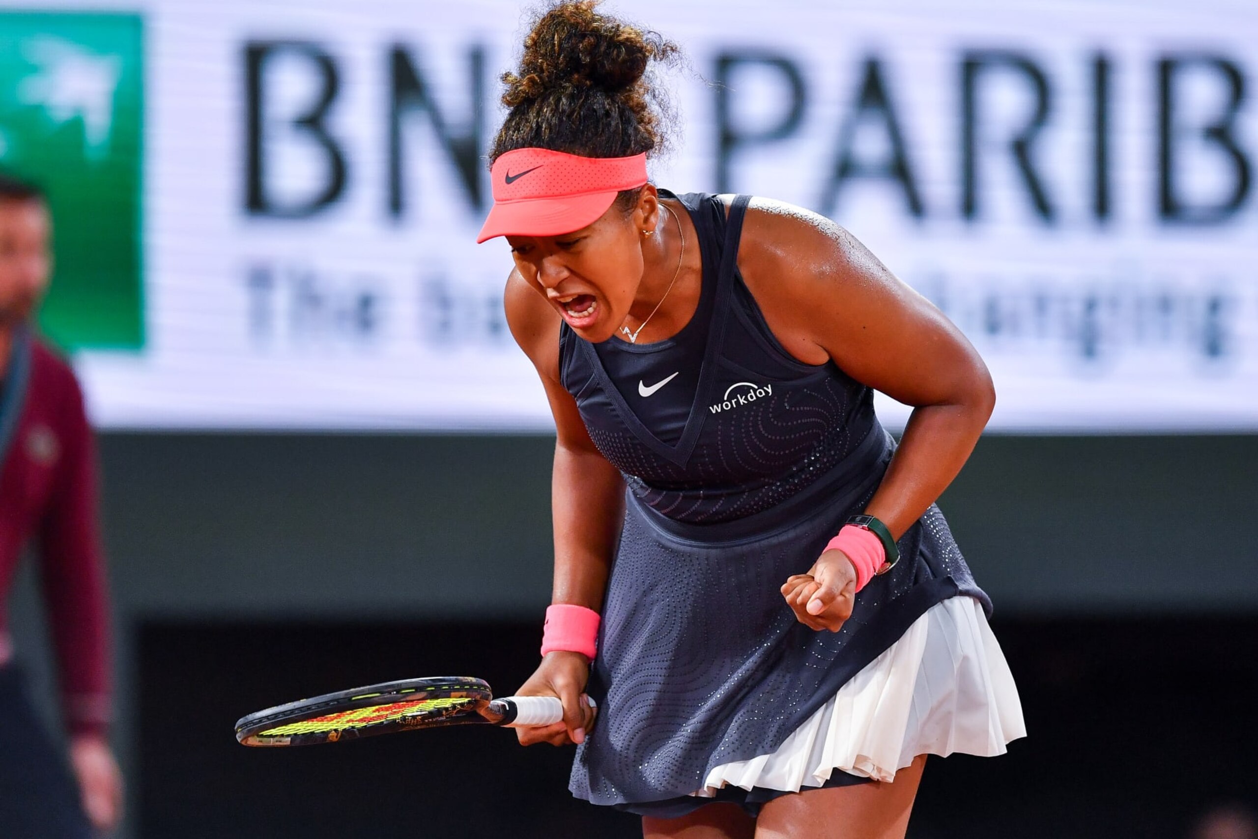 PARIS, FRANCE - MAY 29: Naomi Osaka of Japan celebrates a point against Iga Swiatek of Poland in the Women's Singles second round match during Day Four of the 2024 French Open at Roland Garros on May 29, 2024 in Paris, France. (Photo by Franco Arland/Getty Images)