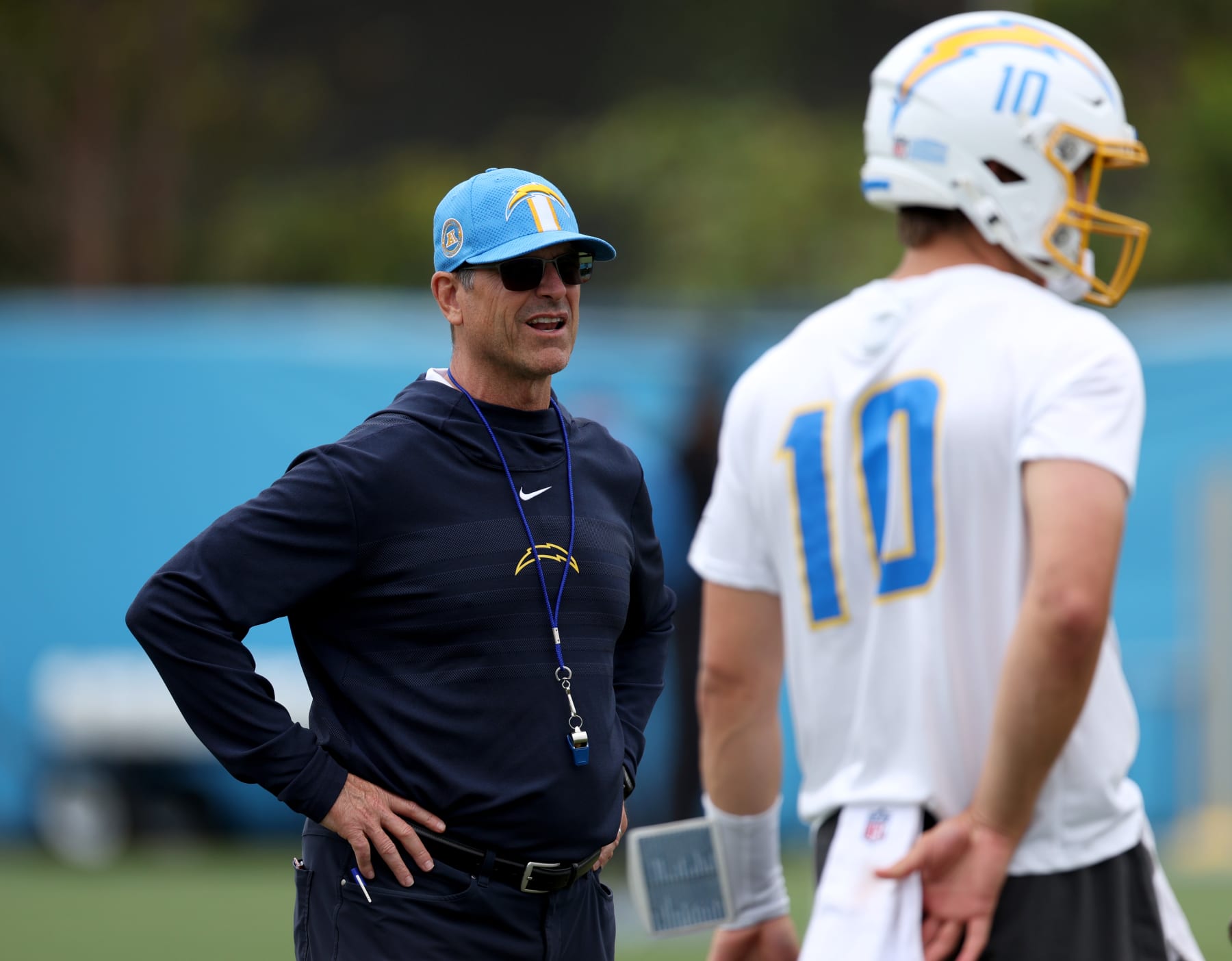 New Chargers head coach Jim Harbaugh and QB Justin Herbert