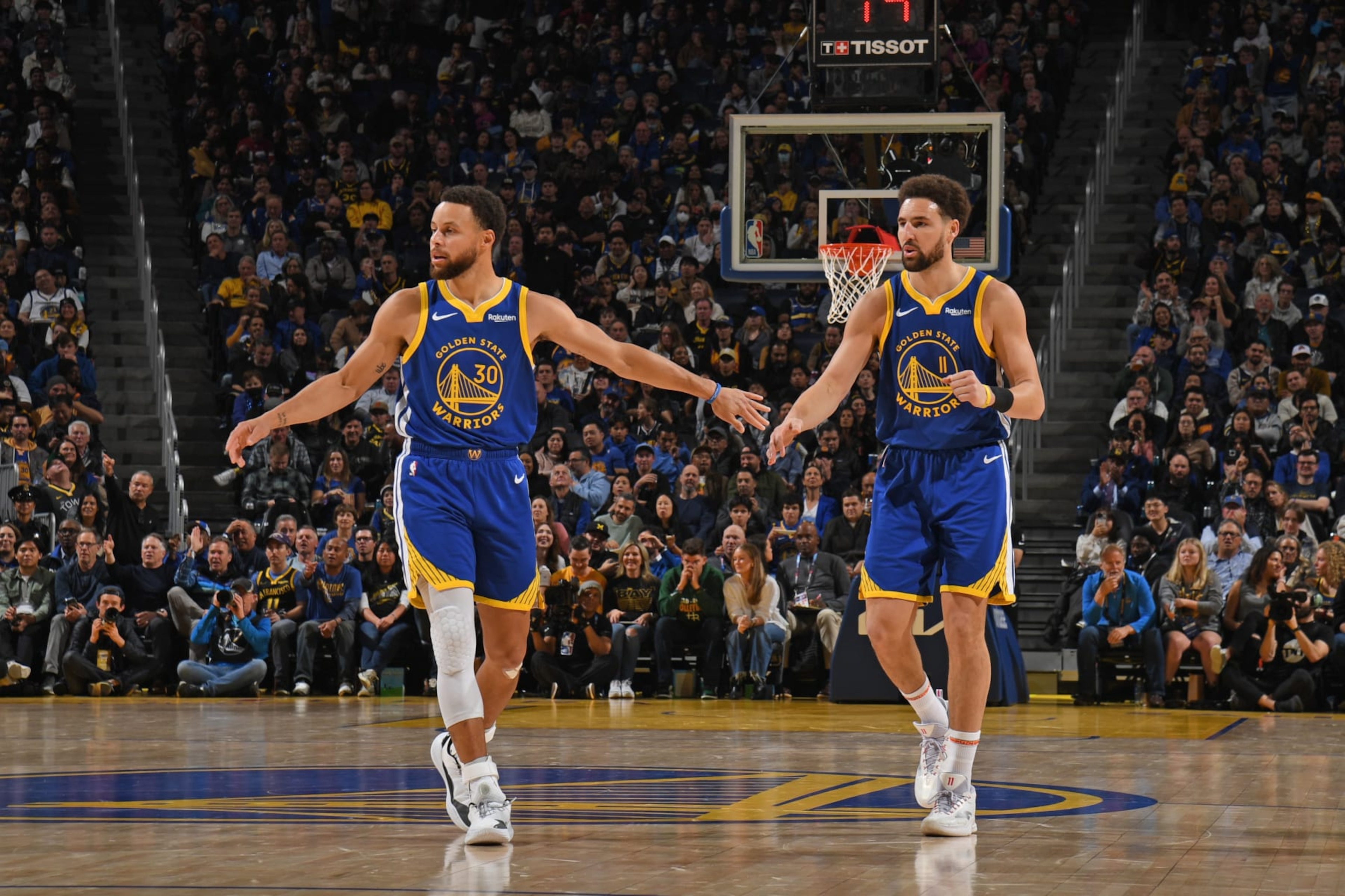 SAN FRANCISCO, CA - JANUARY 4: Stephen Curry #30 of the Golden State Warriors high fives Klay Thompson #11 of the Golden State Warriors during the game against the Denver Nuggets on January 4, 2024 at Chase Center in San Francisco, California. NOTE TO USER: User expressly acknowledges and agrees that, by downloading and or using this photograph, user is consenting to the terms and conditions of Getty Images License Agreement. Mandatory Copyright Notice: Copyright 2024 NBAE (Photo by Noah Graham/NBAE via Getty Images) SAN FRANCISCO, CA - JANUARY 4: Stephen Curry #30 of the Golden State Warriors high fives Klay Thompson #11 of the Golden State Warriors during the game against the Denver Nuggets on January 4, 2024 at Chase Center in San Francisco, California. NOTE TO USER: User expressly acknowledges and agrees that, by downloading and or using this photograph, user is consenting to the terms and conditions of Getty Images License Agreement. Mandatory Copyright Notice: Copyright 2024 NBAE (Photo by Noah Graham/NBAE via Getty Images)