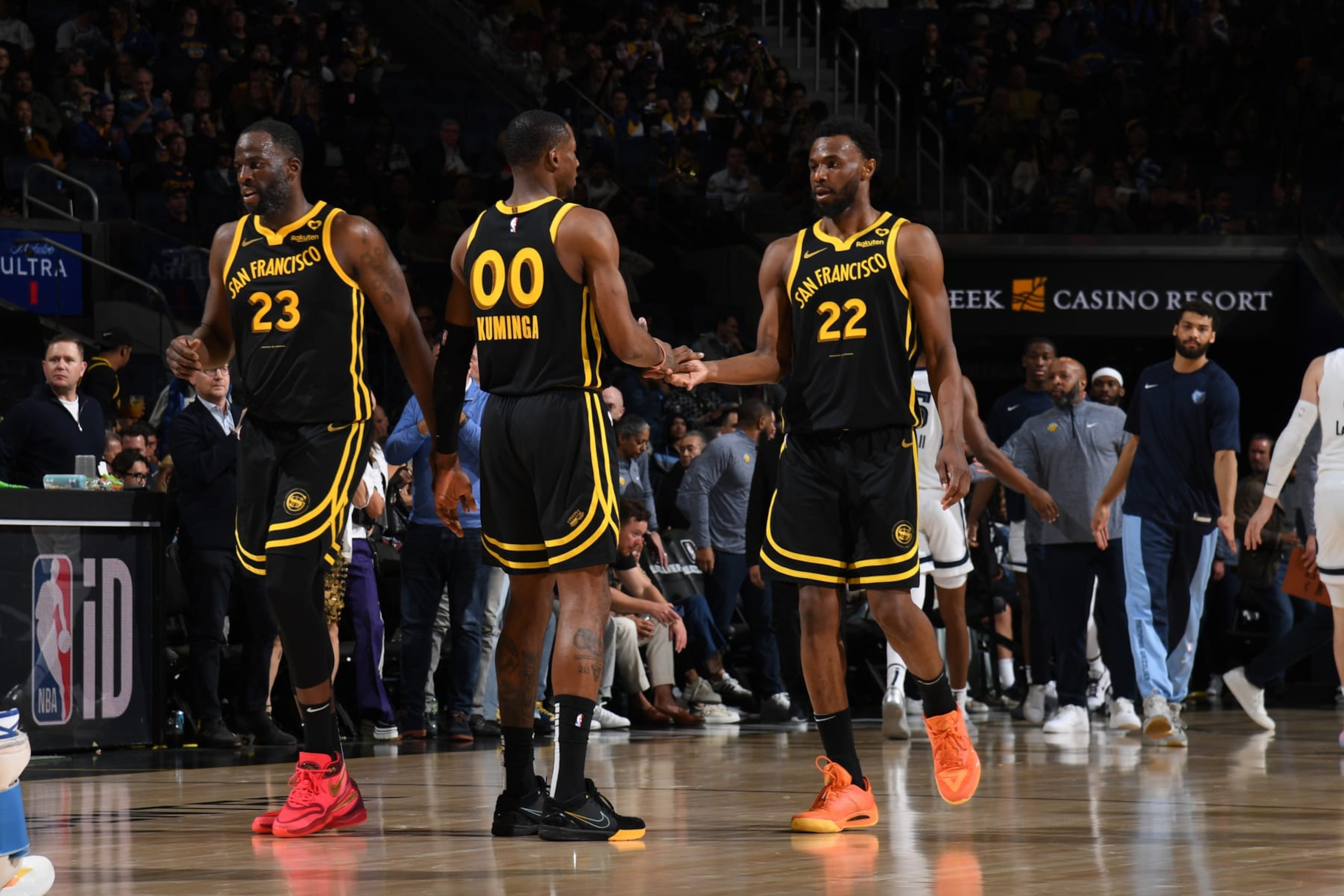 SAN FRANCISCO, CA - MARCH 20: Jonathan Kuminga #00 and Andrew Wiggins #22 of the Golden State Warriors high five during the game against the Memphis Grizzlies on March 20, 2024 at Chase Center in San Francisco, California. NOTE TO USER: User expressly acknowledges and agrees that, by downloading and or using this photograph, user is consenting to the terms and conditions of Getty Images License Agreement. Mandatory Copyright Notice: Copyright 2024 NBAE (Photo by Noah Graham/NBAE via Getty Images) SAN FRANCISCO, CA - MARCH 20: Jonathan Kuminga #00 and Andrew Wiggins #22 of the Golden State Warriors high five during the game against the Memphis Grizzlies on March 20, 2024 at Chase Center in San Francisco, California. NOTE TO USER: User expressly acknowledges and agrees that, by downloading and or using this photograph, user is consenting to the terms and conditions of Getty Images License Agreement. Mandatory Copyright Notice: Copyright 2024 NBAE (Photo by Noah Graham/NBAE via Getty Images)