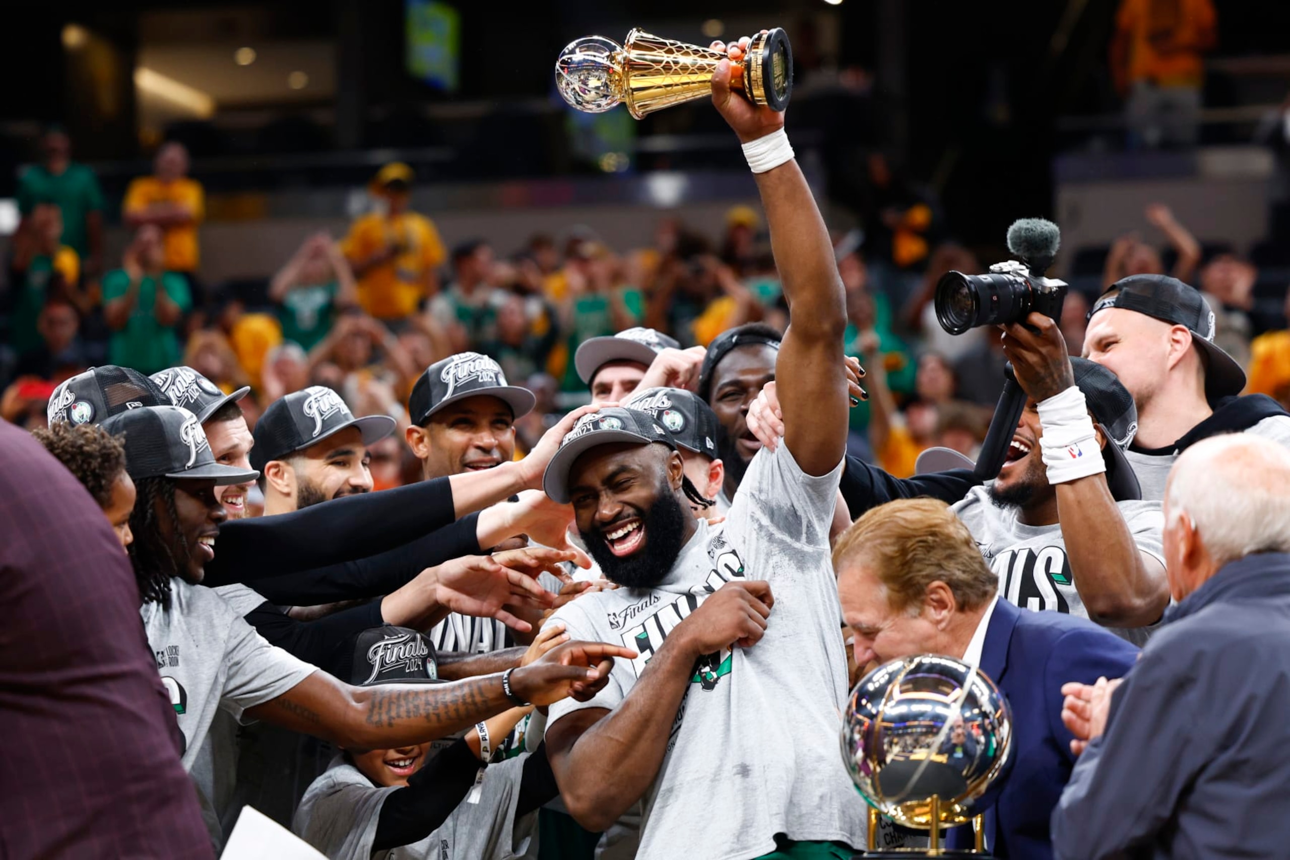 Indianapolis, IN - May 27: Boston Celtics guard Jaylen Brown holds up the Larry Bird trophy after being named 2024 Eastern Conference Finals MVP. (Photo by Danielle Parhizkaran/The Boston Globe via Getty Images) Indianapolis, IN - May 27: Boston Celtics guard Jaylen Brown holds up the Larry Bird trophy after being named 2024 Eastern Conference Finals MVP. (Photo by Danielle Parhizkaran/The Boston Globe via Getty Images)