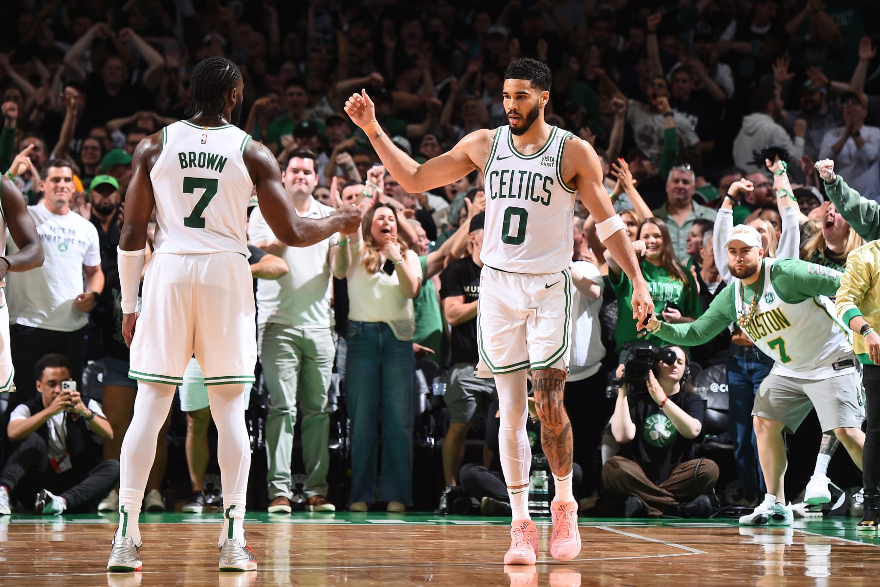 BOSTON, MA - MAY 21: Jayson Tatum #0 and Jaylen Brown #7 of the Boston Celtics high five during the game against the Indiana Pacers during Game 1 of the Eastern Conference Finals of the 2024 NBA Playoffs on May 21, 2024 at the TD Garden in Boston, Massachusetts. NOTE TO USER: User expressly acknowledges and agrees that, by downloading and or using this photograph, User is consenting to the terms and conditions of the Getty Images License Agreement. Mandatory Copyright Notice: Copyright 2024 NBAE  (Photo by Brian Babineau/NBAE via Getty Images)