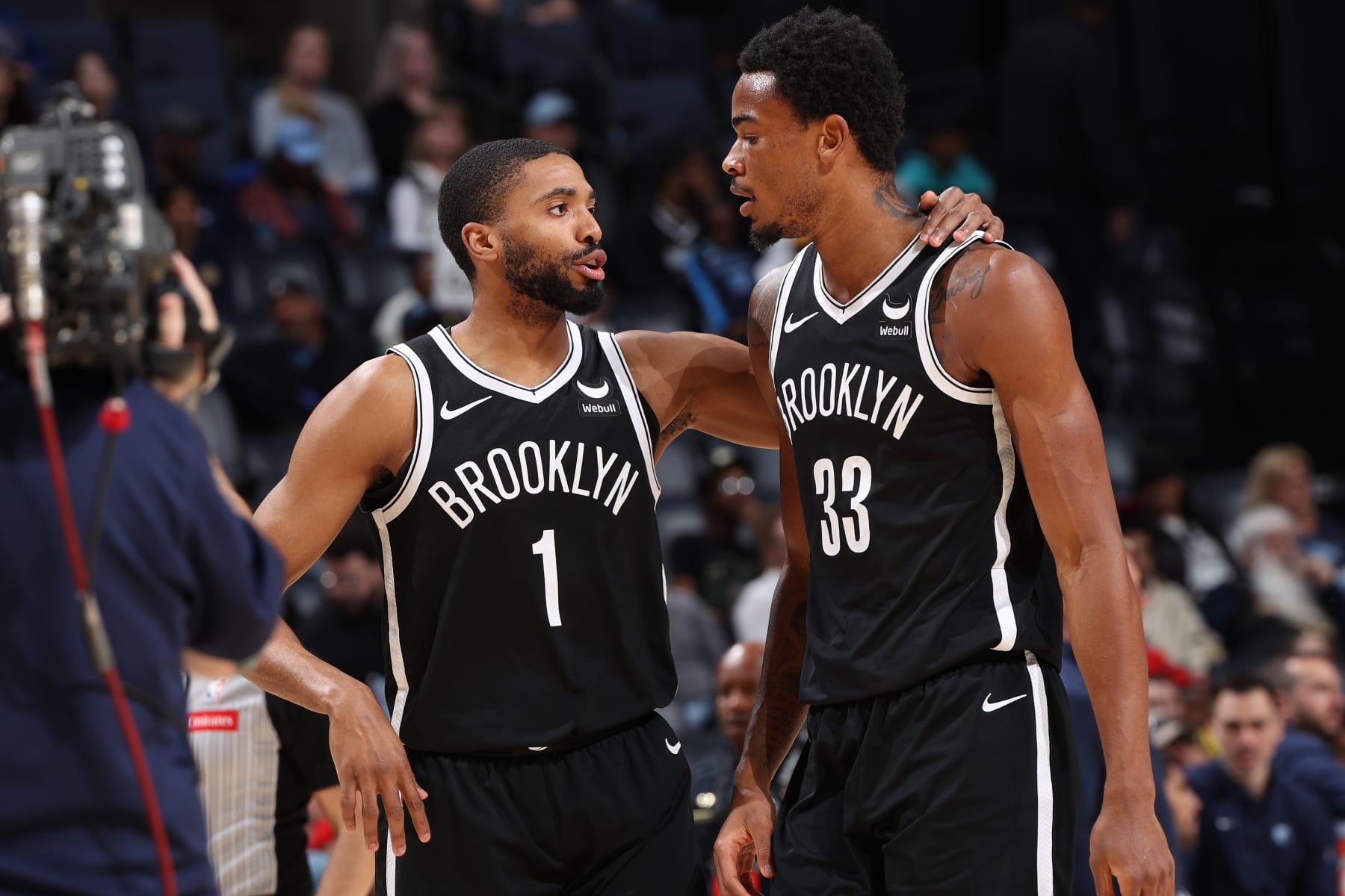 MEMPHIS, TN - February 26:  Mikal Bridges #1 and Nicolas Claxton #33 of the Brooklyn Nets talk during the game against the Memphis Grizzlies on February 26, 2024 at FedExForum in Memphis, Tennessee. NOTE TO USER: User expressly acknowledges and agrees that, by downloading and or using this photograph, User is consenting to the terms and conditions of the Getty Images License Agreement. Mandatory Copyright Notice: Copyright 2024 NBAE (Photo by Joe Murphy/NBAE via Getty Images)