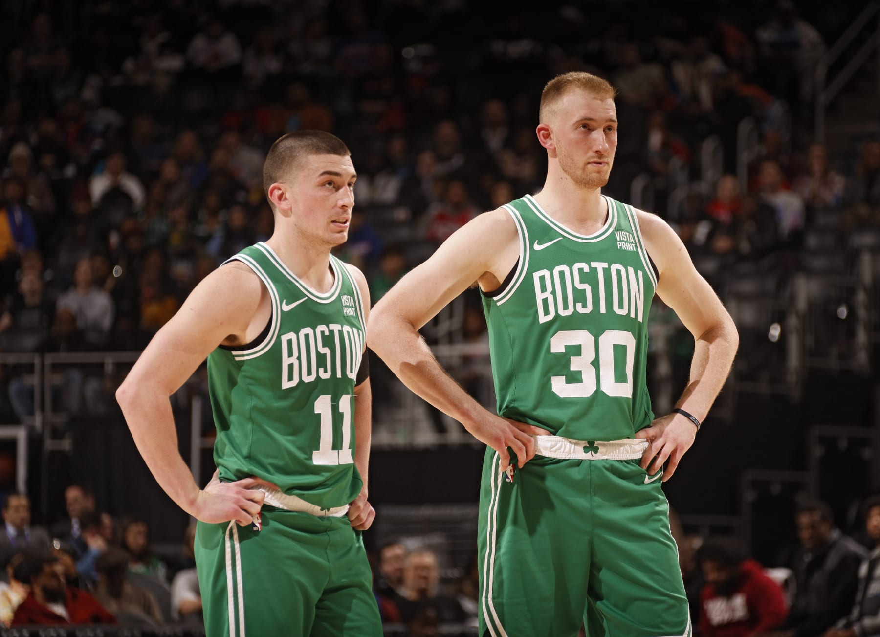 DETROIT, MI - MARCH 22: Payton Pritchard #11 and Sam Hauser #30 of the Boston Celtics looks on during the game against the Detroit Pistons on March 22, 2024 at Little Caesars Arena in Detroit, Michigan. NOTE TO USER: User expressly acknowledges and agrees that, by downloading and/or using this photograph, User is consenting to the terms and conditions of the Getty Images License Agreement. Mandatory Copyright Notice: Copyright 2024 NBAE (Photo by Brian Sevald/NBAE via Getty Images)