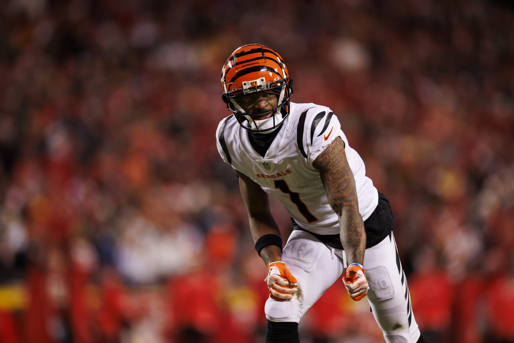 KANSAS CITY, MISSOURI - DECEMBER 31: Ja'Marr Chase #1 of the Cincinnati Bengals lines up to run a route during an NFL football game against the Kansas City Chiefs at GEHA Field at Arrowhead Stadium on December 31, 2023 in Kansas City, Missouri. (Photo by Ryan Kang/Getty Images)